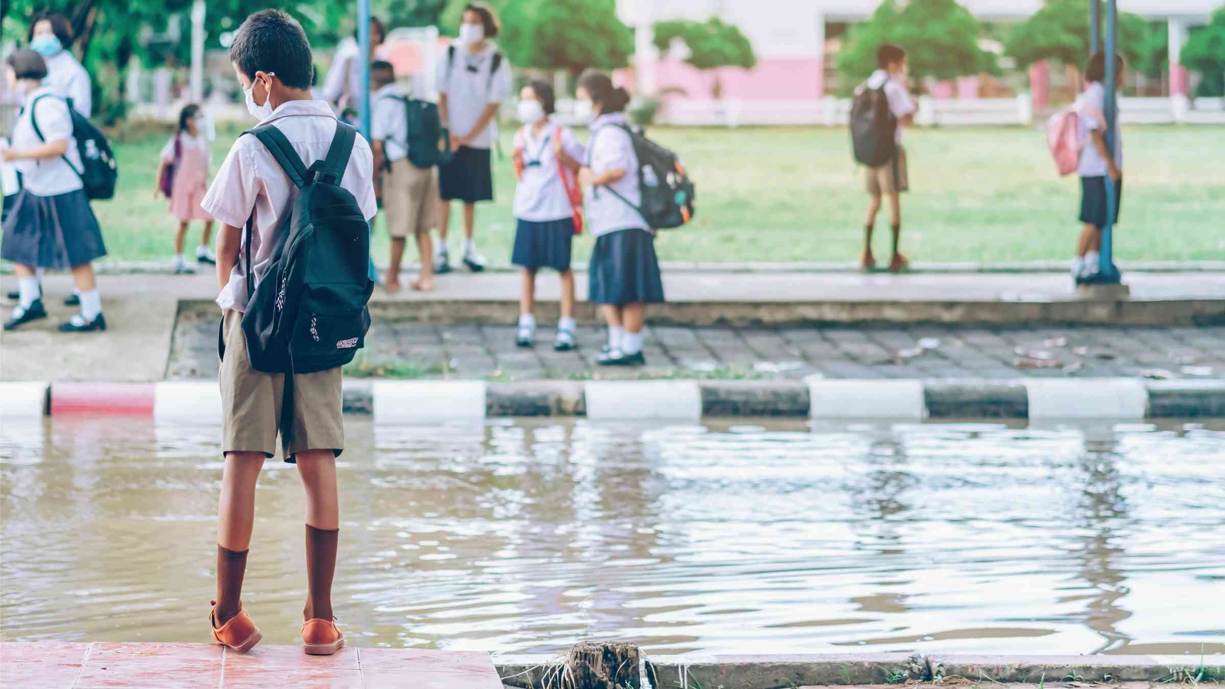 Students return home after heavy rains in Kanchanaburi, Thailand