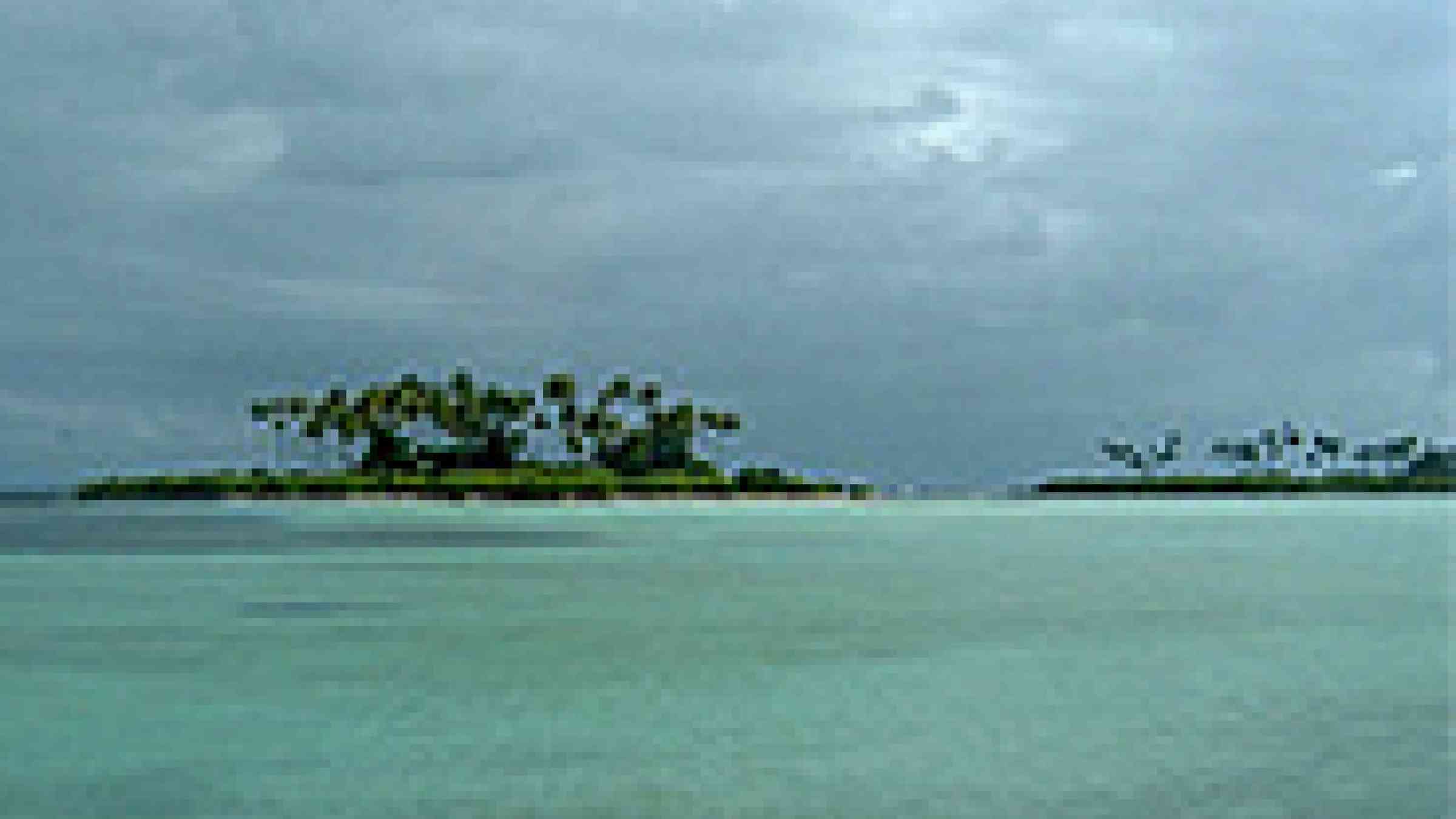 An atoll in the Rep. of Kiribati by Flickr user, luigig, Creative Commons Attribution 2.0 Generic, http://www.flickr.com/photos/luigi_and_linda/2570411802/