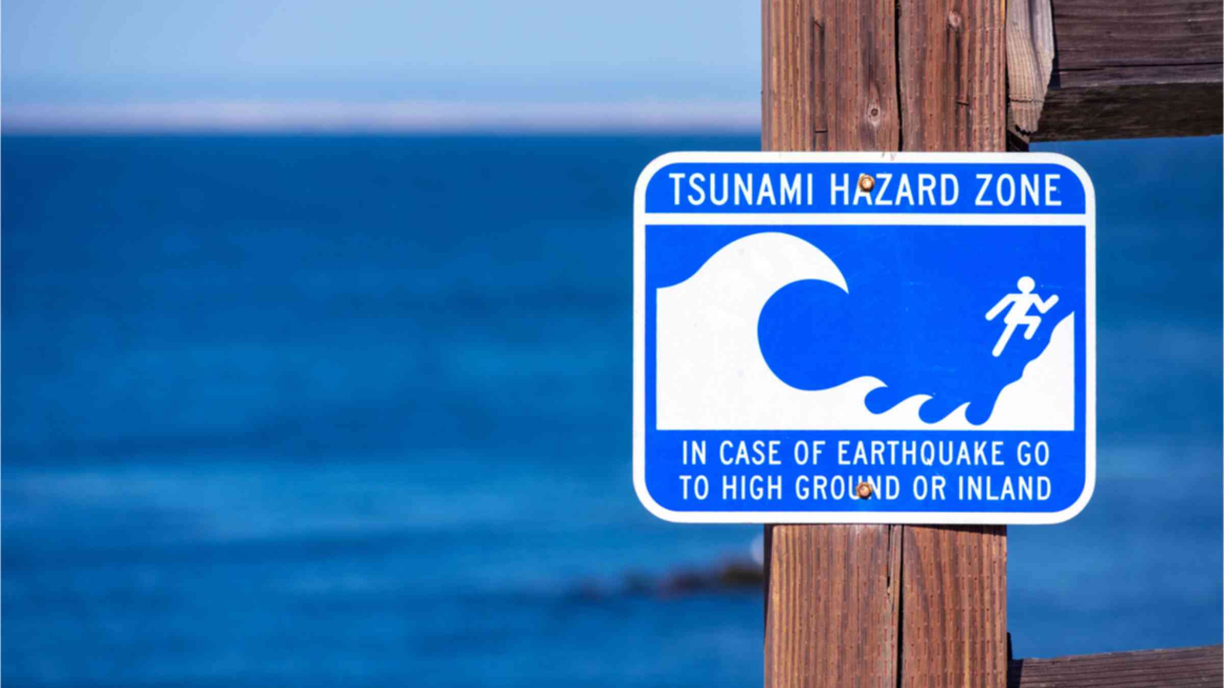 The Pacific Coast Tsunami Hazard Zone warning sign warns the public of potential dangers following an earthquake.
