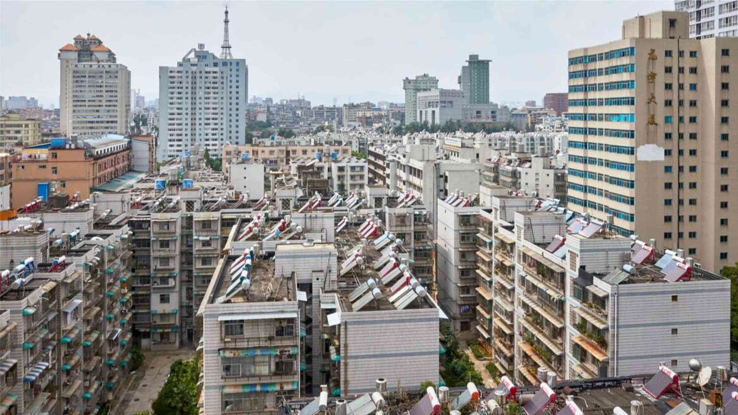 Solar panels on residential buildings rooftops in Kunming, China