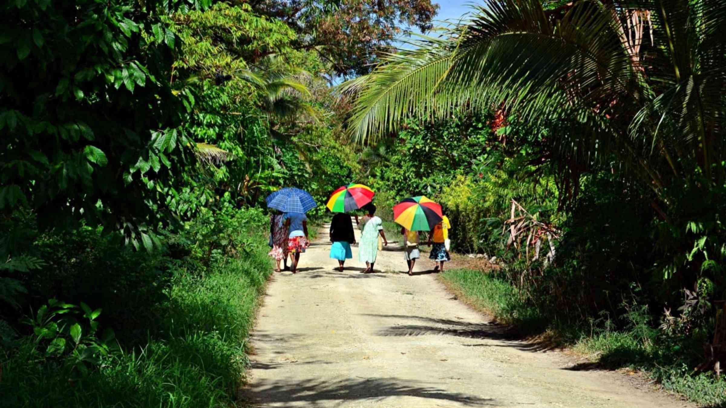 Women walking on Malo Island, Vanuatu
