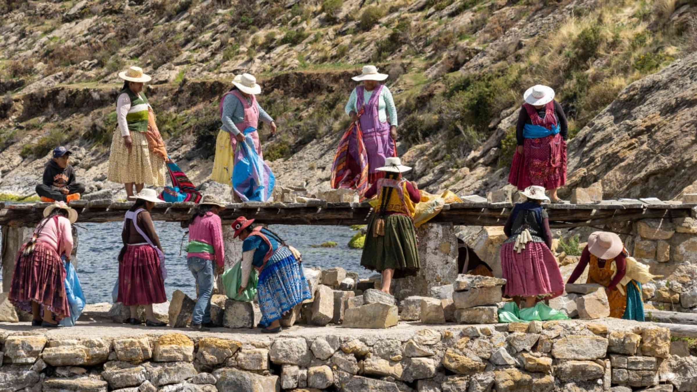 Women in Bolivia reconstruct the Temple on Isla del Sol using all hand tools