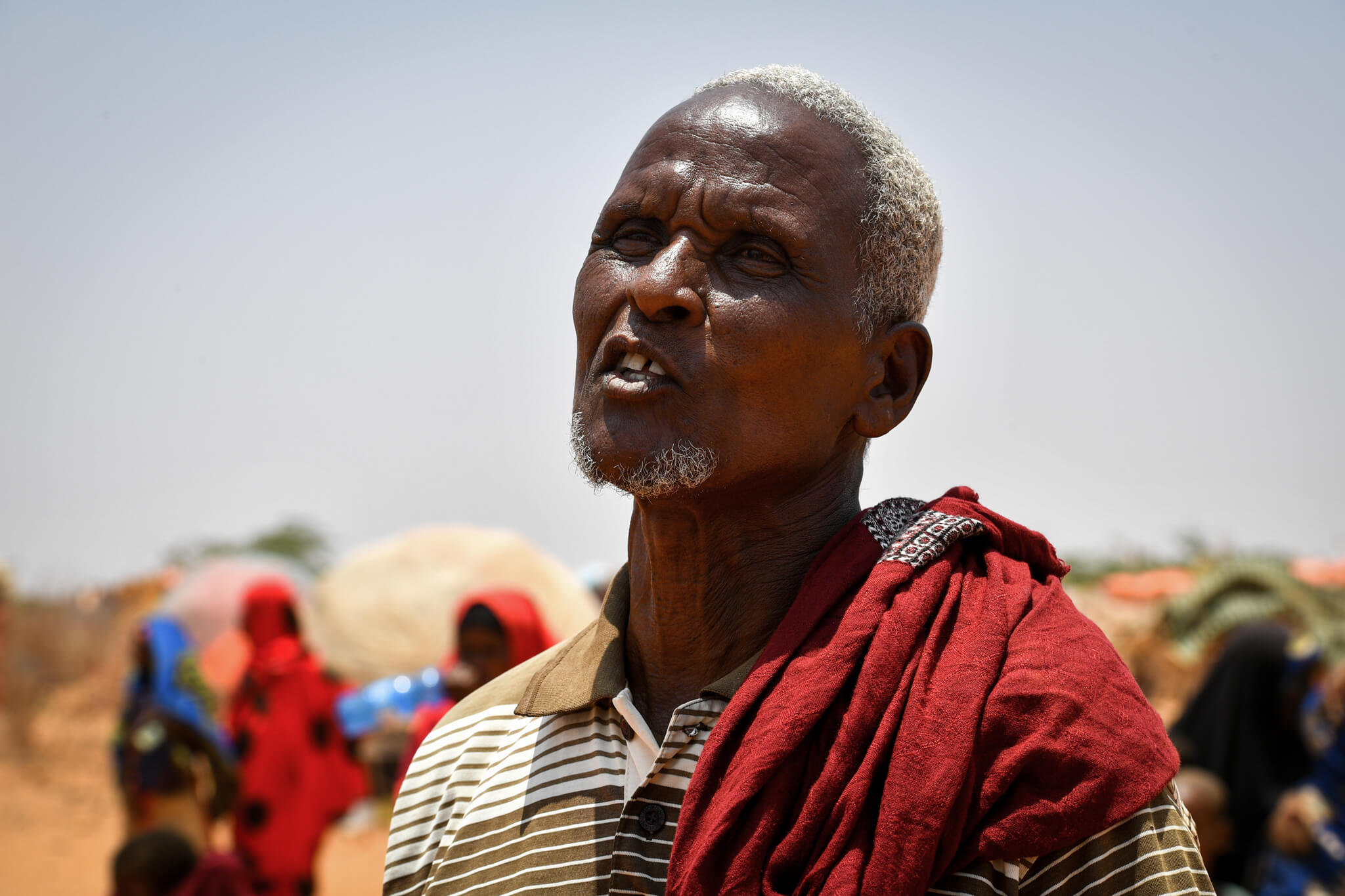 Standing in front of his makeshift home in a camp for internally displaced people (IDP) in southern Somalia’s Luuq district