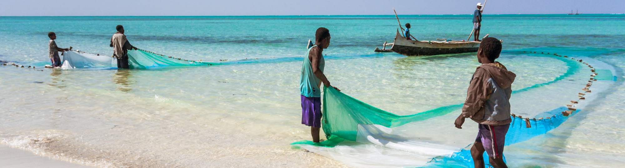 Six fishermen and their fishing net in the Salary lagoon, southwestern Madagascar on July 22, 2016