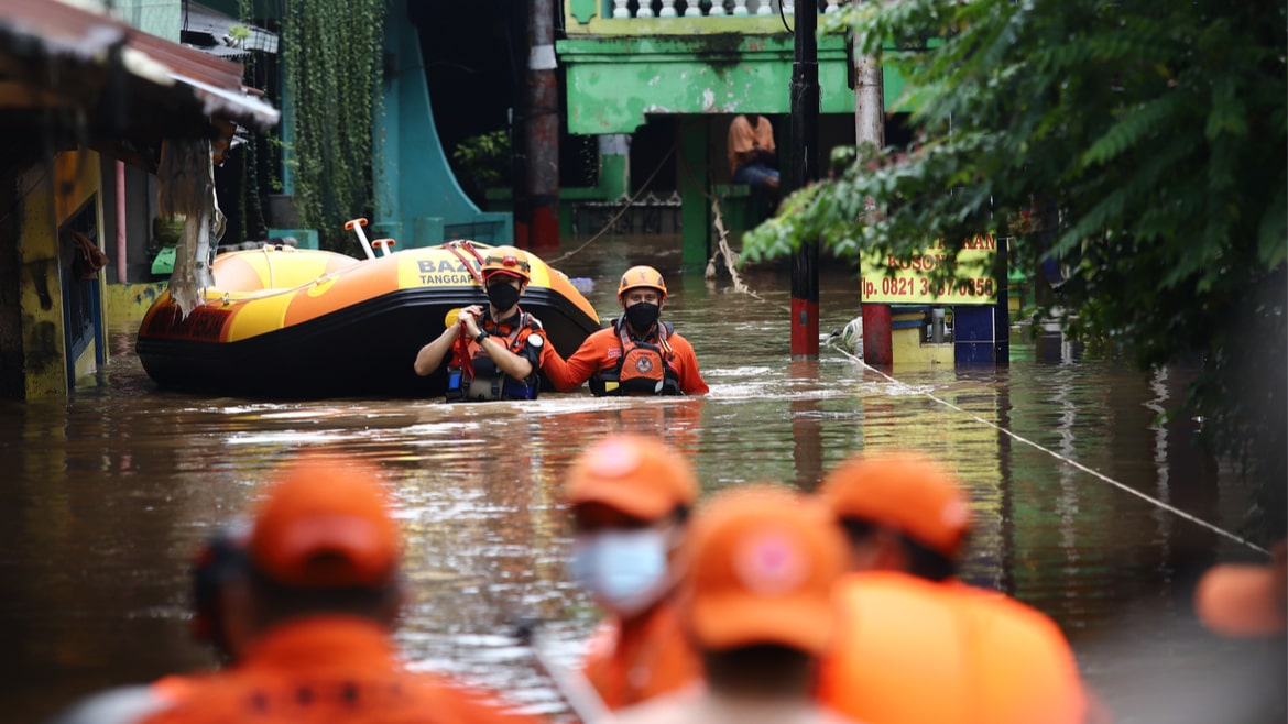 The Search and Rescue Team evacuated residents during floods with a depth of more than one meter in Cipinang Melayu on February 20, 2021 in Jakarta.