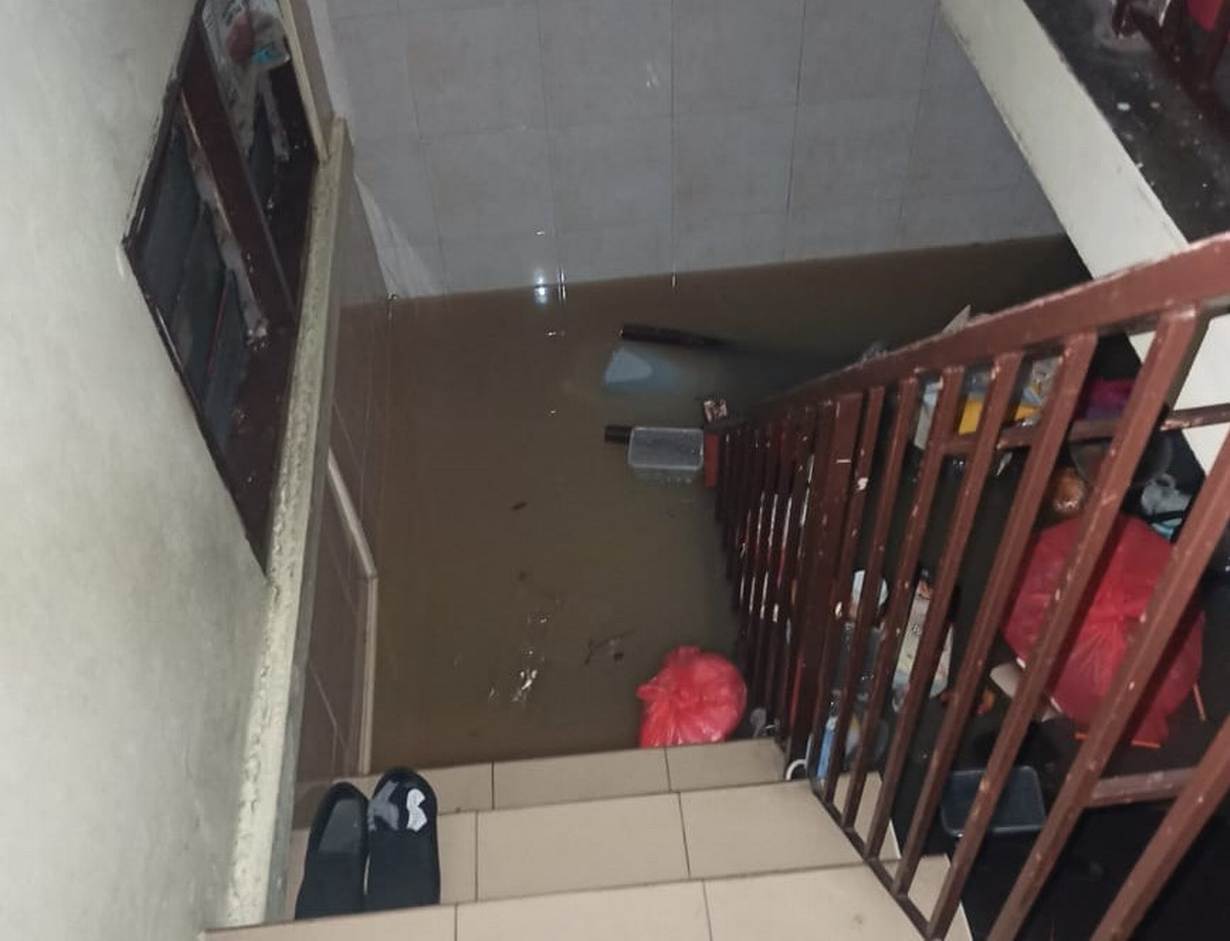 Destruction caused by floods to Elizabeth Chong's family home in Kuala Lumpur, Malaysia. December 18 2021. Thomson Reuters Foundation/Elizabeth Chong