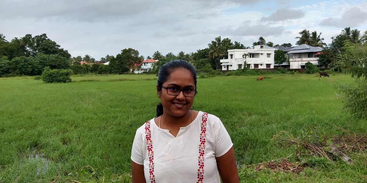 Photo of smiling woman in the field