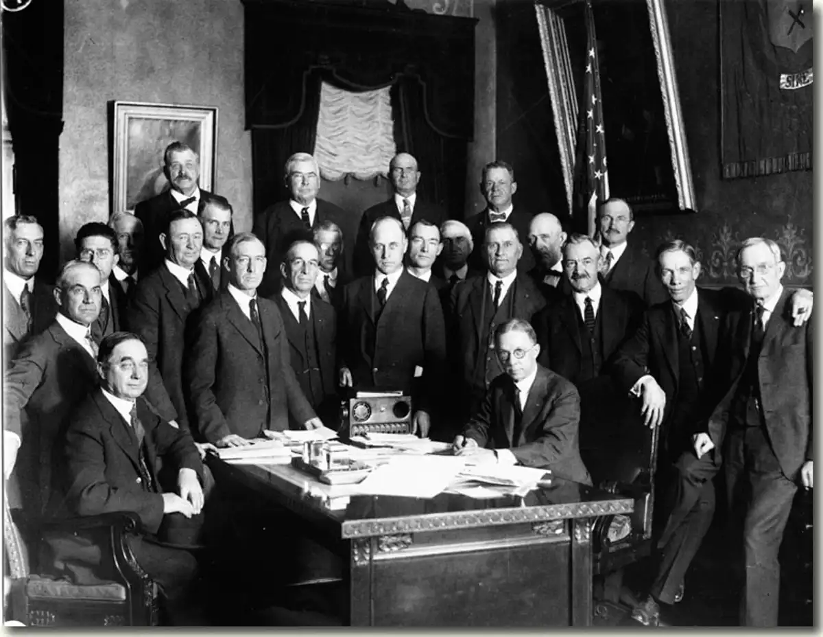 Delph Carpenter, standing at center, at the signing of bills approving the Colorado River and South Platte River compacts in 1925.  Colorado State University Water Resources Archive, CC BY-ND