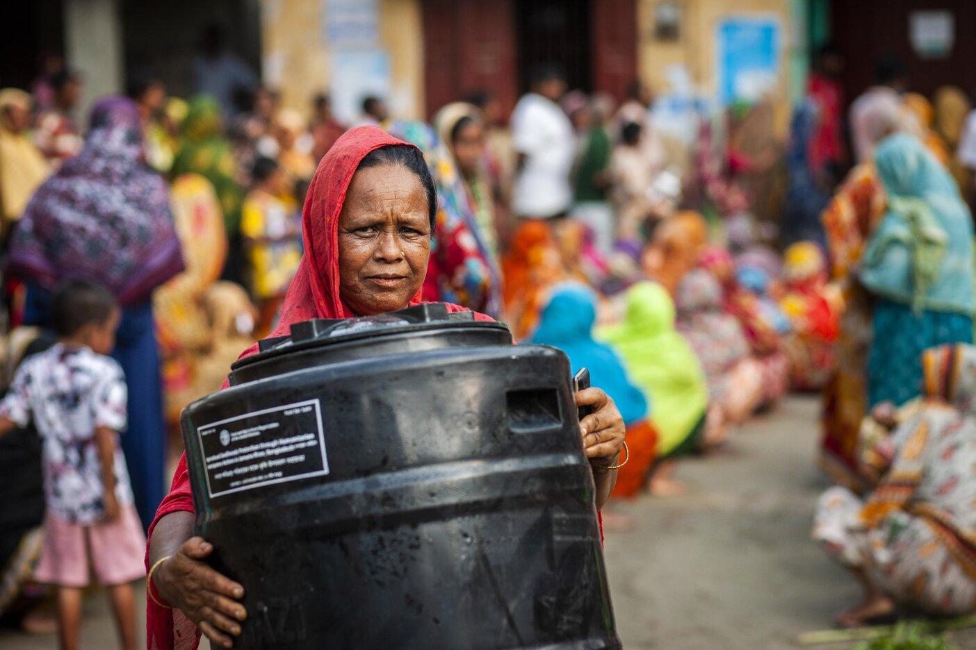 In Bangladesh, people received cash, storage drums like this one, hygiene and health kits ahead of flooding in July 2020. Credit: FAO/Fahad Kaizer