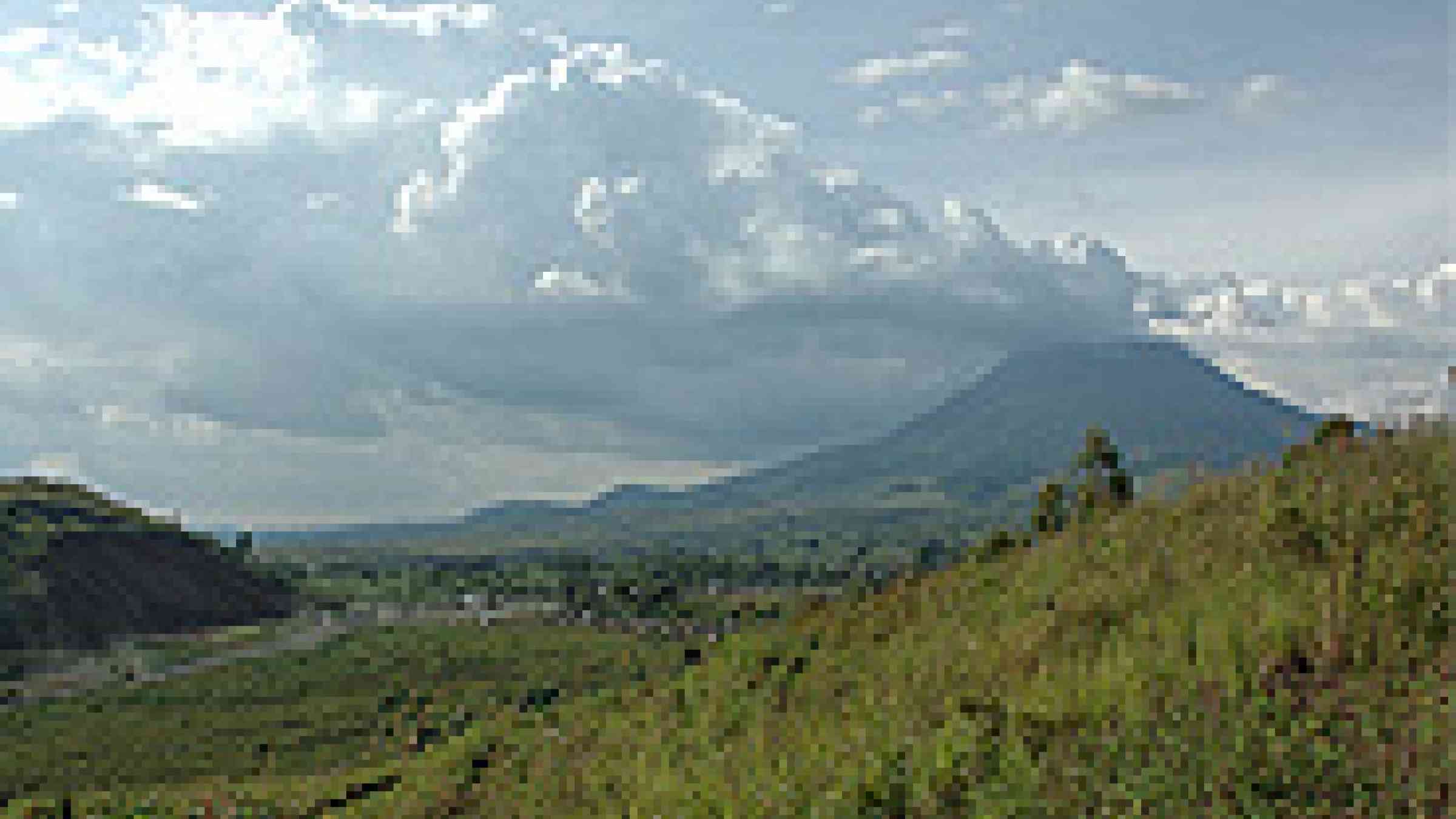 Photo of the hills above Goma, by Flickr user Julien Harneis, Creative Commons Attribution-Share Alike 2.0 Generic, http://www.flickr.com/photos/julien_harneis/436306113/