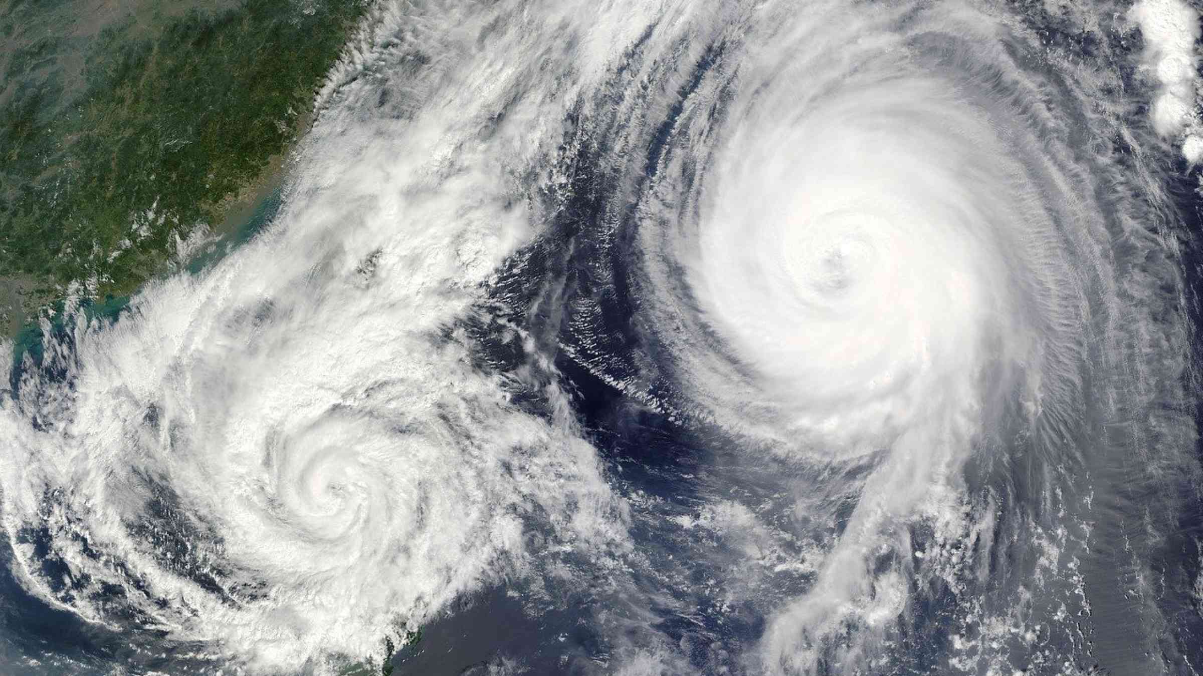 Hurricanes approaching land, satellite image