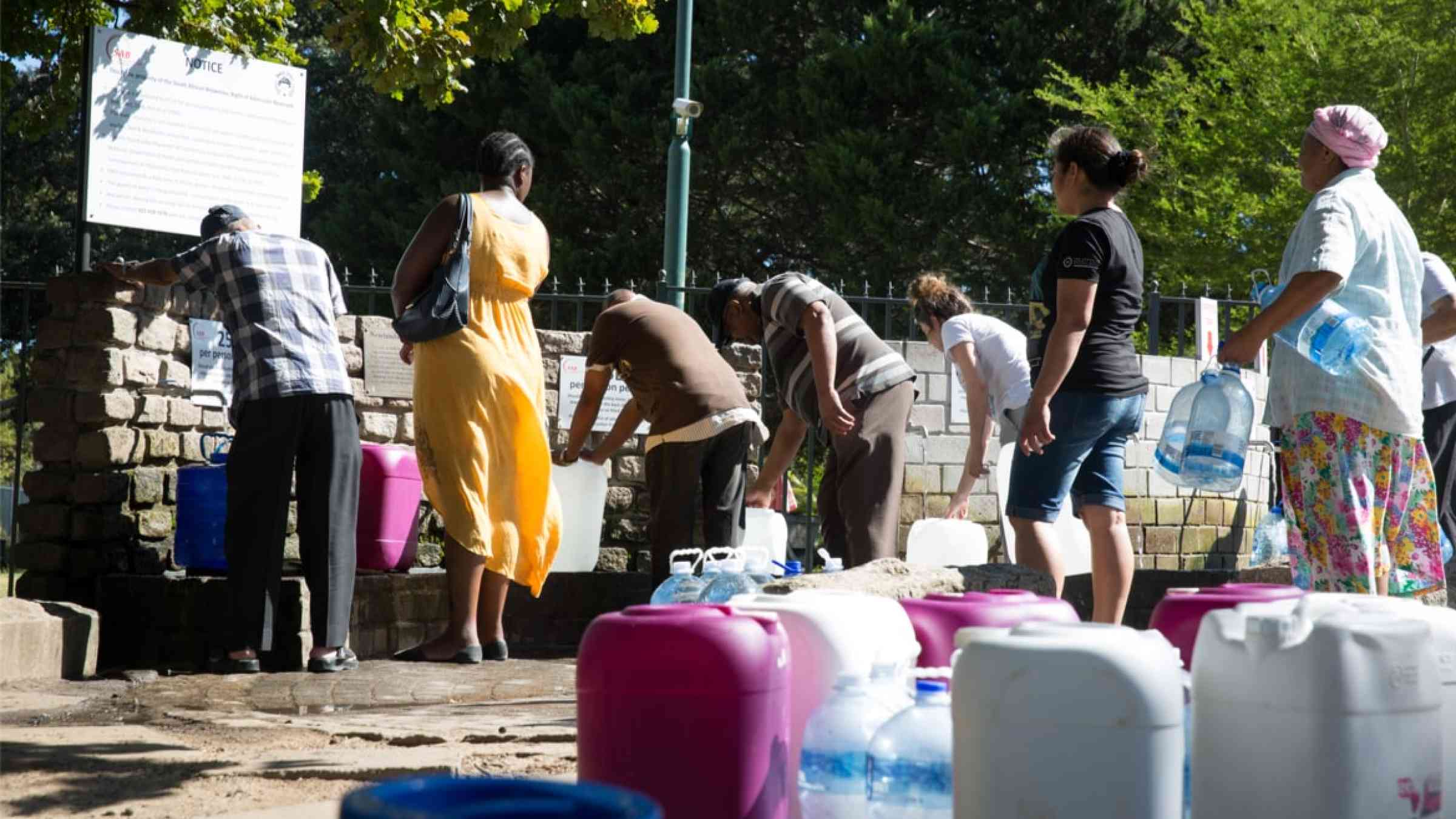 Lines of people waiting to collect natural spring water for drinking during the drought in Cape Town, South Africa (2018)