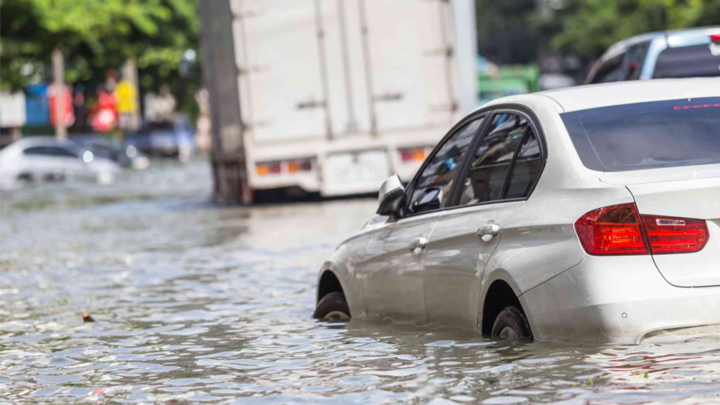 Cars in a street affected by floods