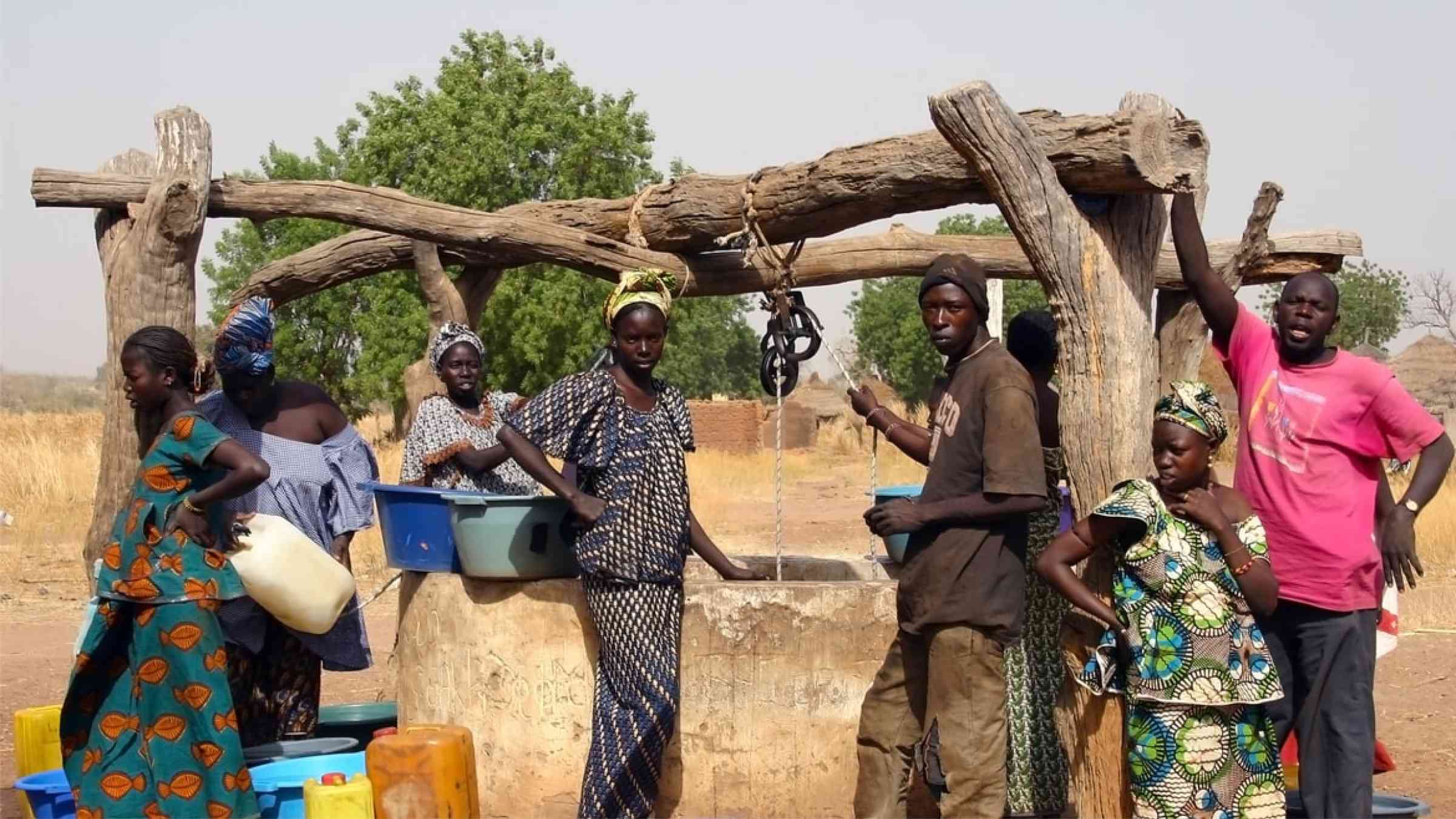 People working on water extraction around a well in Senegal (2007)