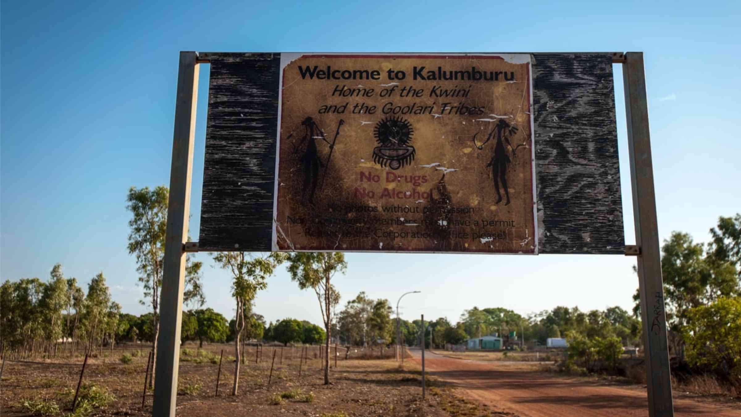 Welcome to Kalumburu sign at the entrance to a remote outback Aboriginal community in Western Australia's Kimberley region (2013)
