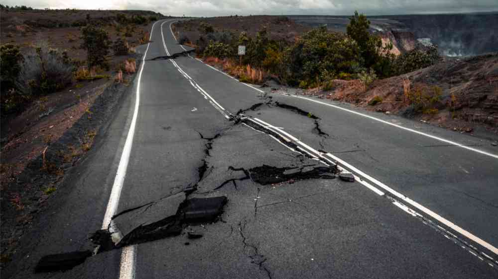 Damaged asphalt road