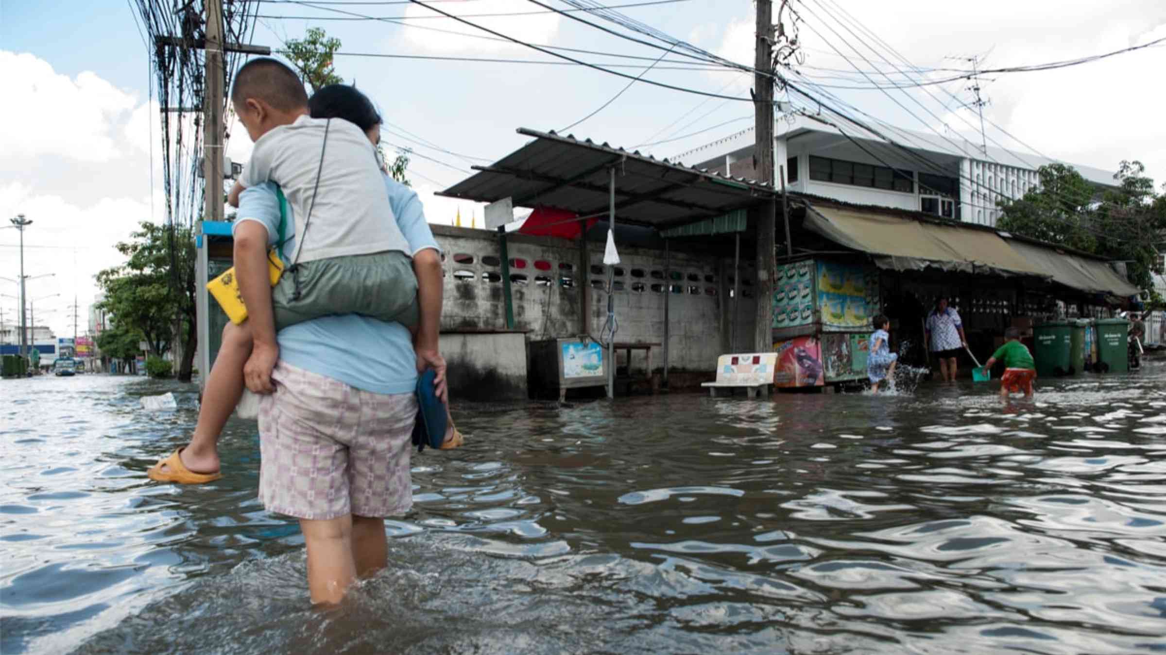 Heavy flooding from monsoon rain and tide from sea in Samutprakarn near Bangkok (2009)