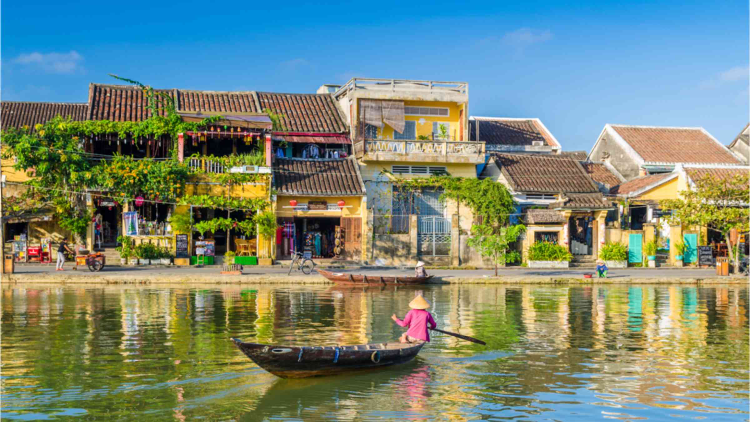A women on a float on the river in Hoi An in Vietnam.