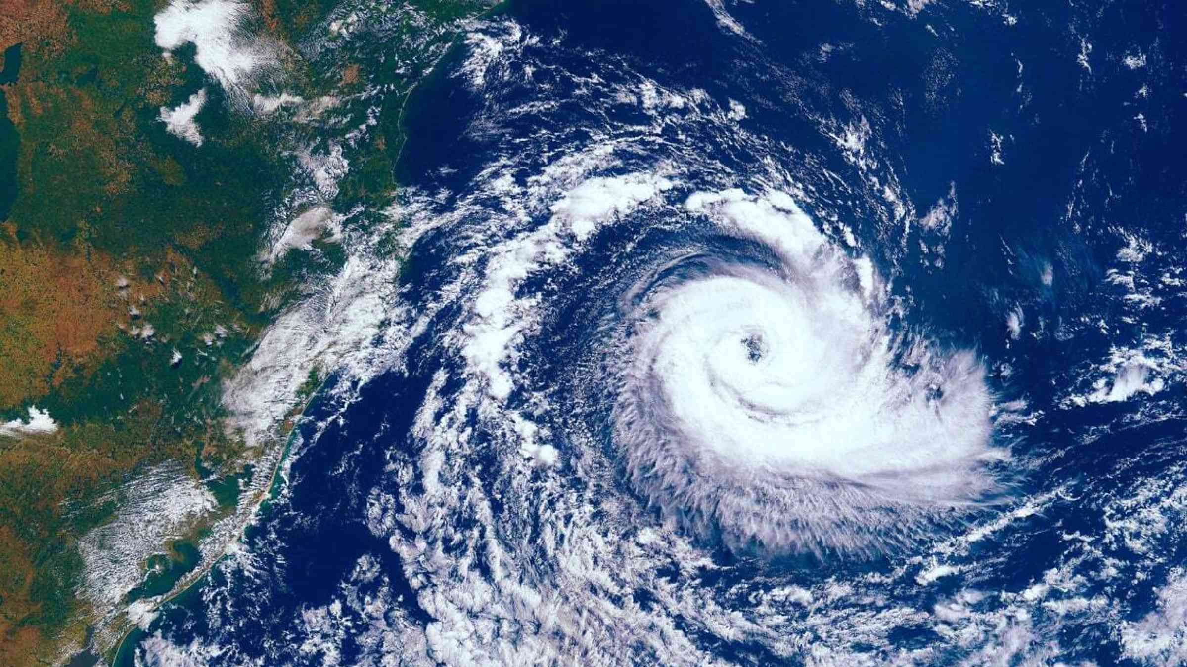 This image shows a class 5 Super Taifun approaching the Asian Pacific coast. The image shows the eye of the hurricane viewed from space.