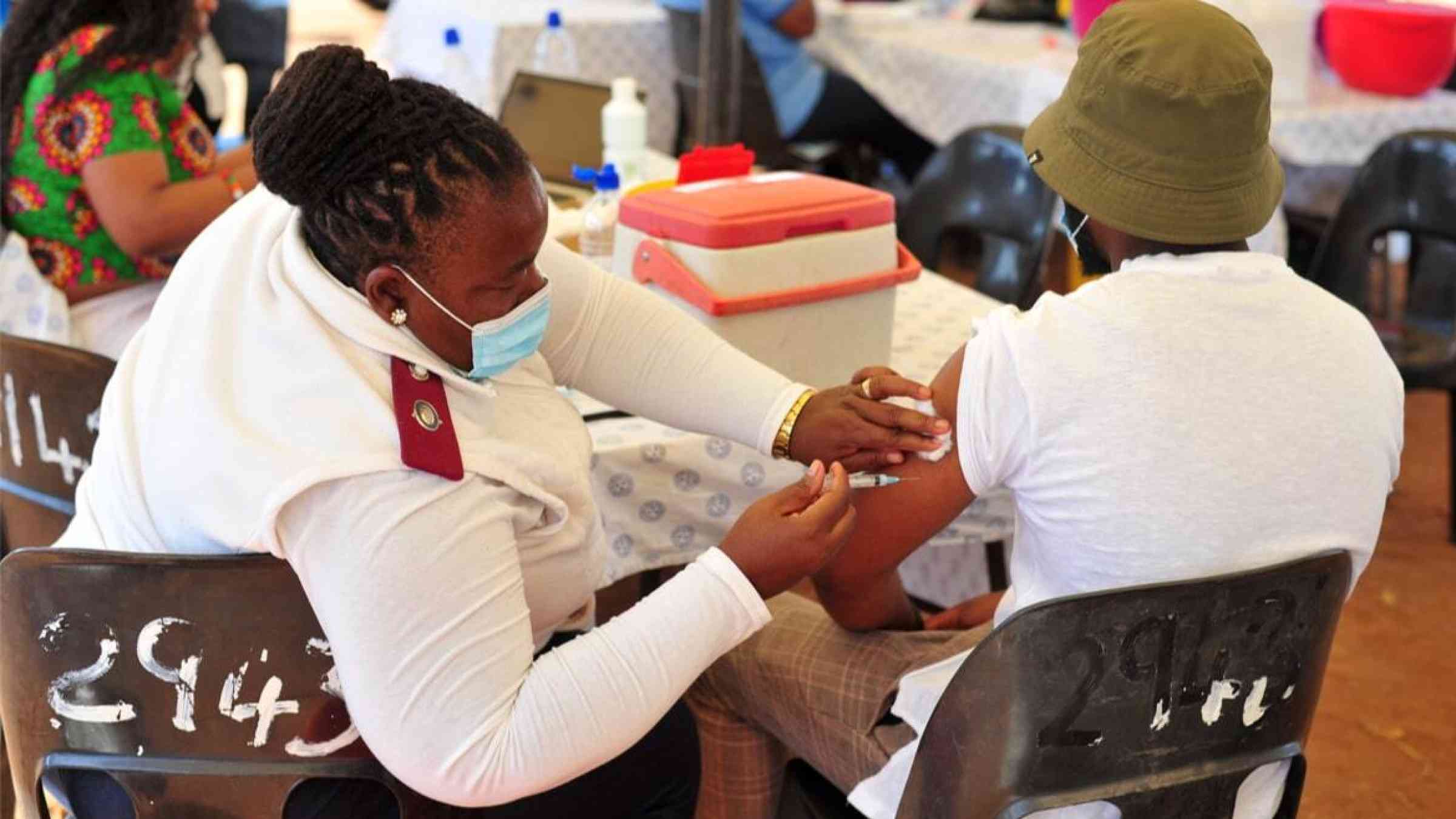 A South African man receives his vaccine dose in Moletijie, Limpopo province