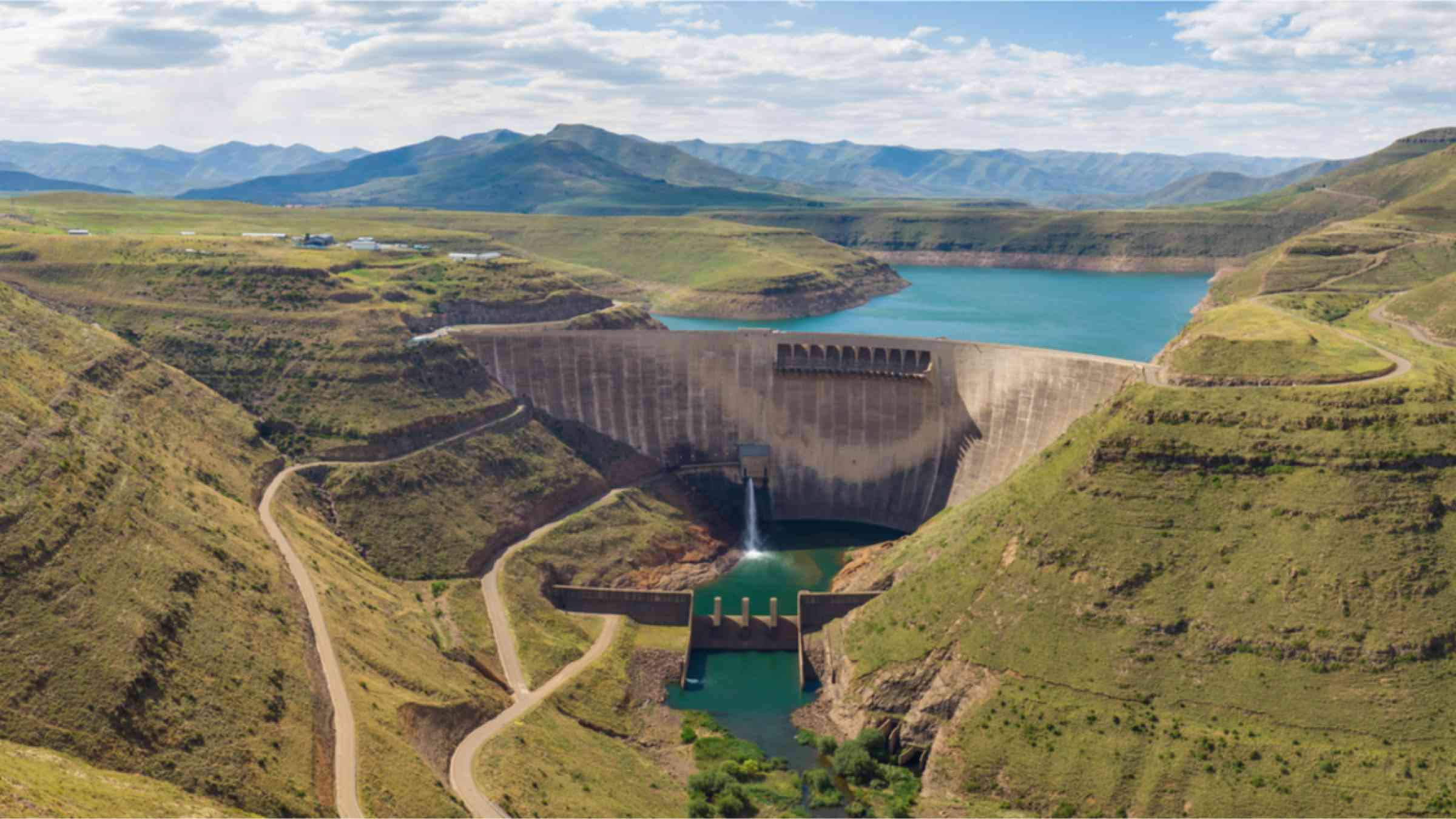 Panorama of the dam and surrounding landscape at Katse Dam in Lesotho in summer with low water level on a clear sunny day