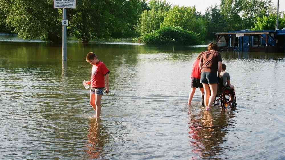 Wheelchair user in flood