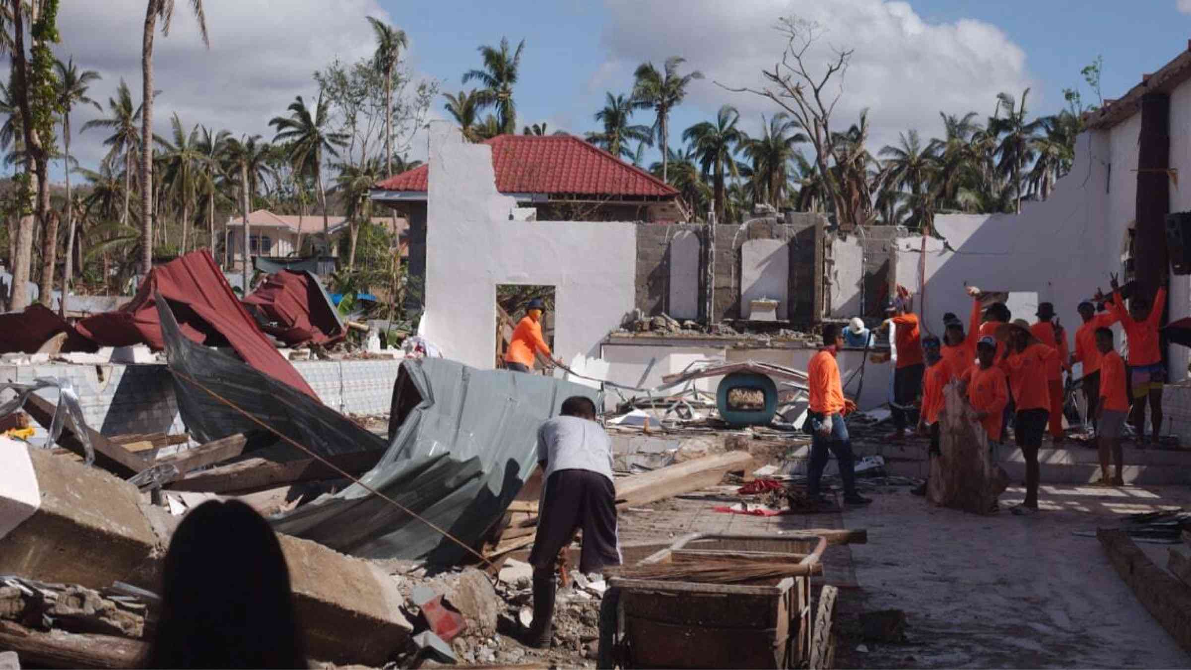 Volunteers support reconstruction work in Macrohon after typhoon Rai