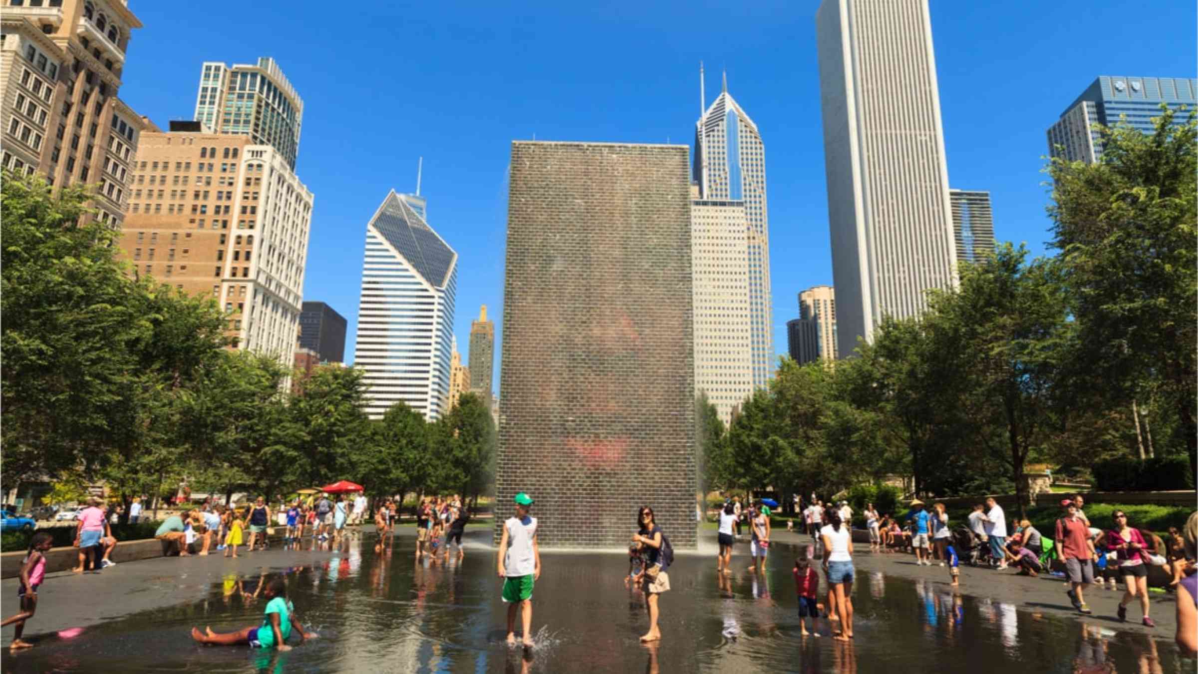 People cooling off in a fountain in Chicago
