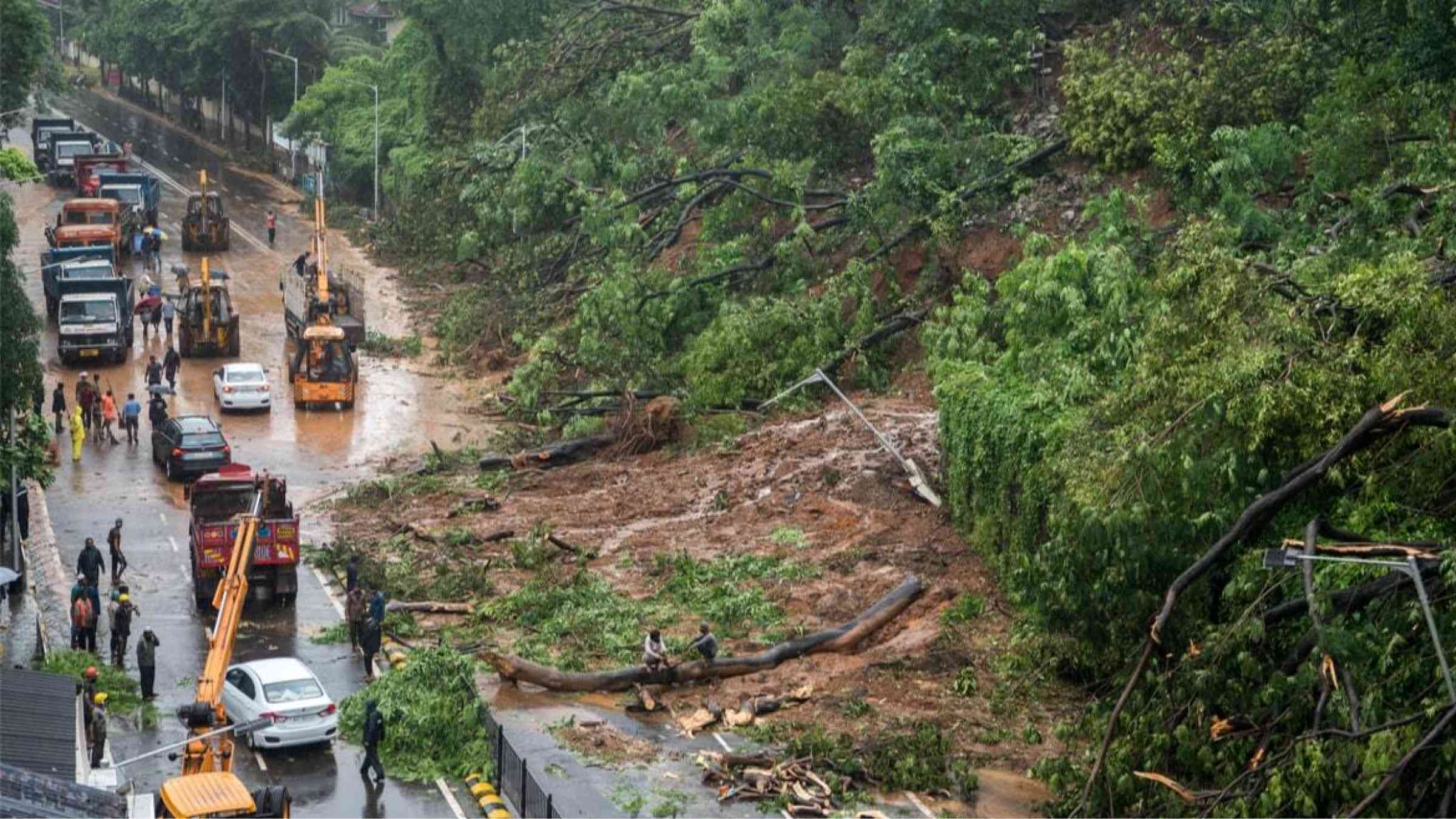 Traffic grows heavy on a Mumbai road after a landslide blocks lanes