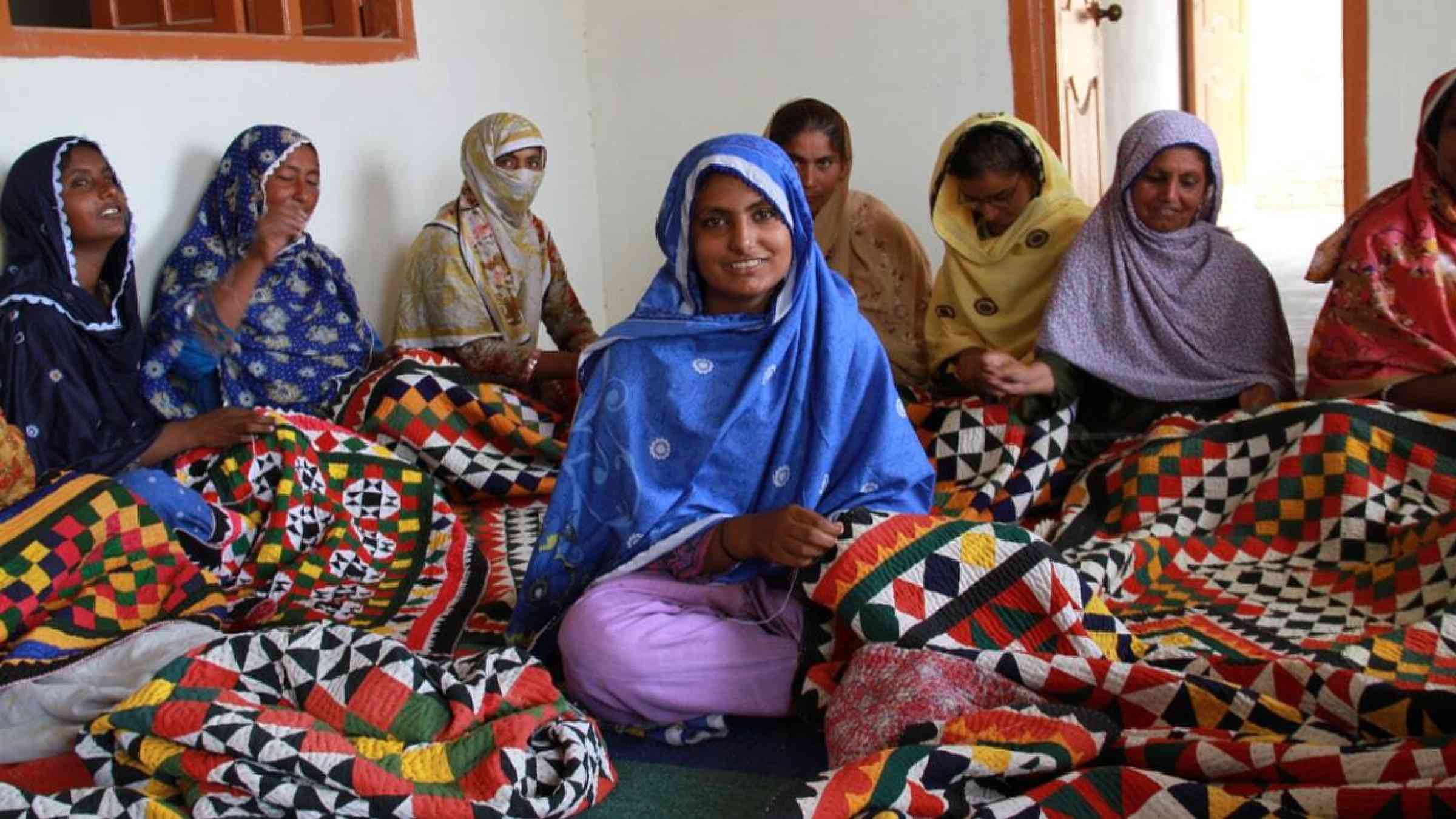 Women weavers sew traditional handicrafts in Sindh, Pakistan