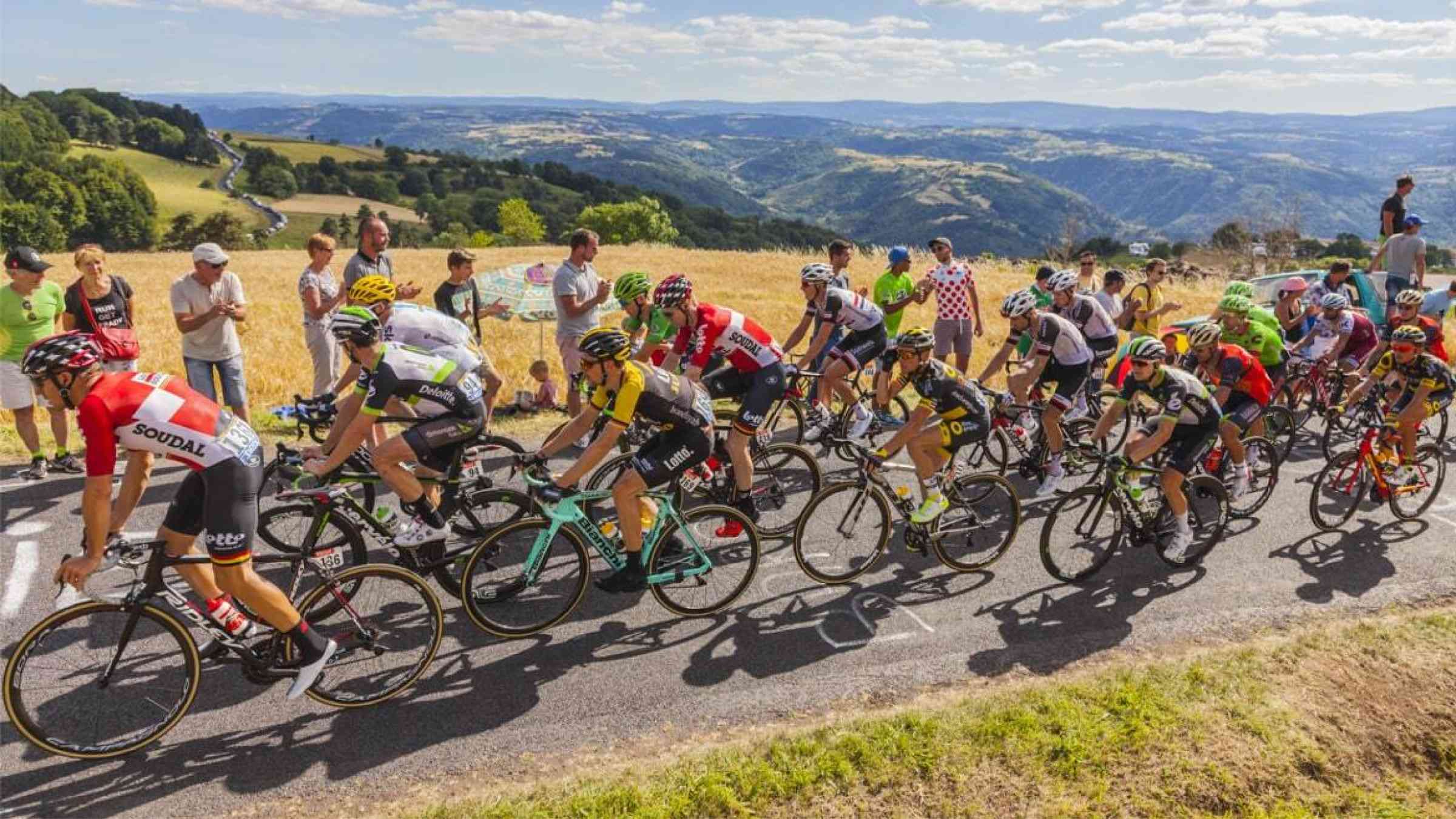 A group of Tour de France cyclists battling