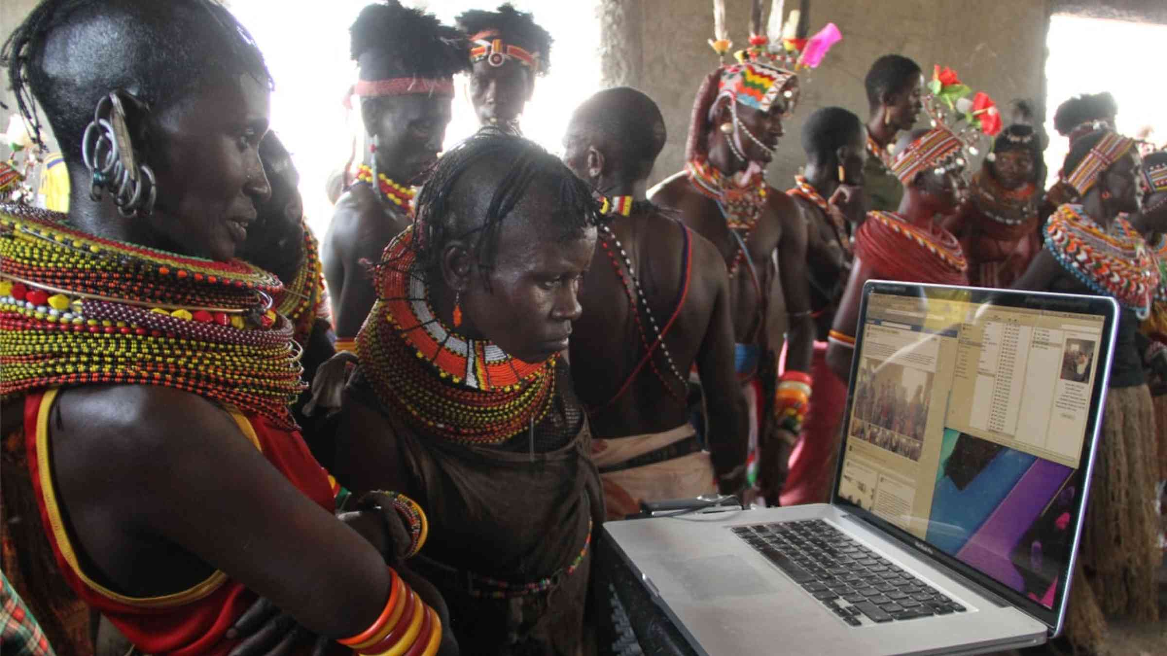Turkana women from Kenya look at images and video