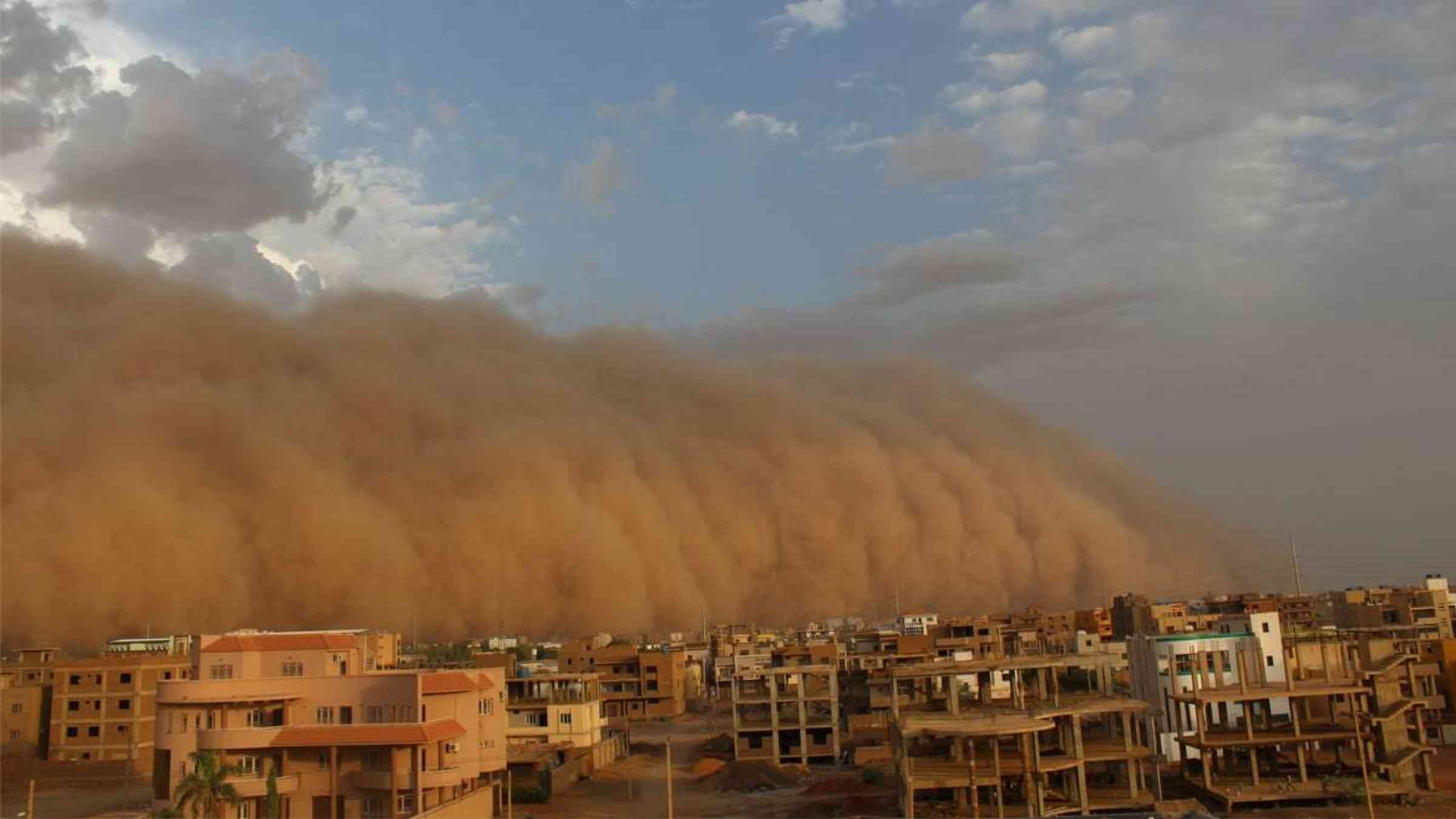 A sandstorm cloud approaches the city of Khartoum in Sudan