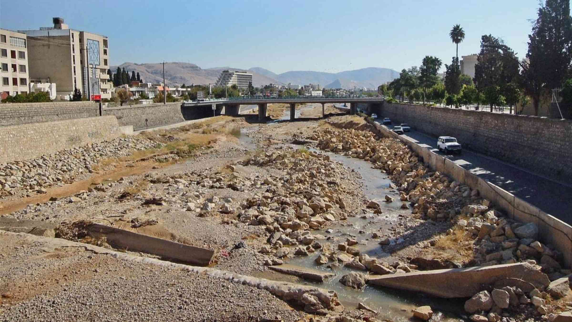 A seasonal river runs low in Shiraz, Iran