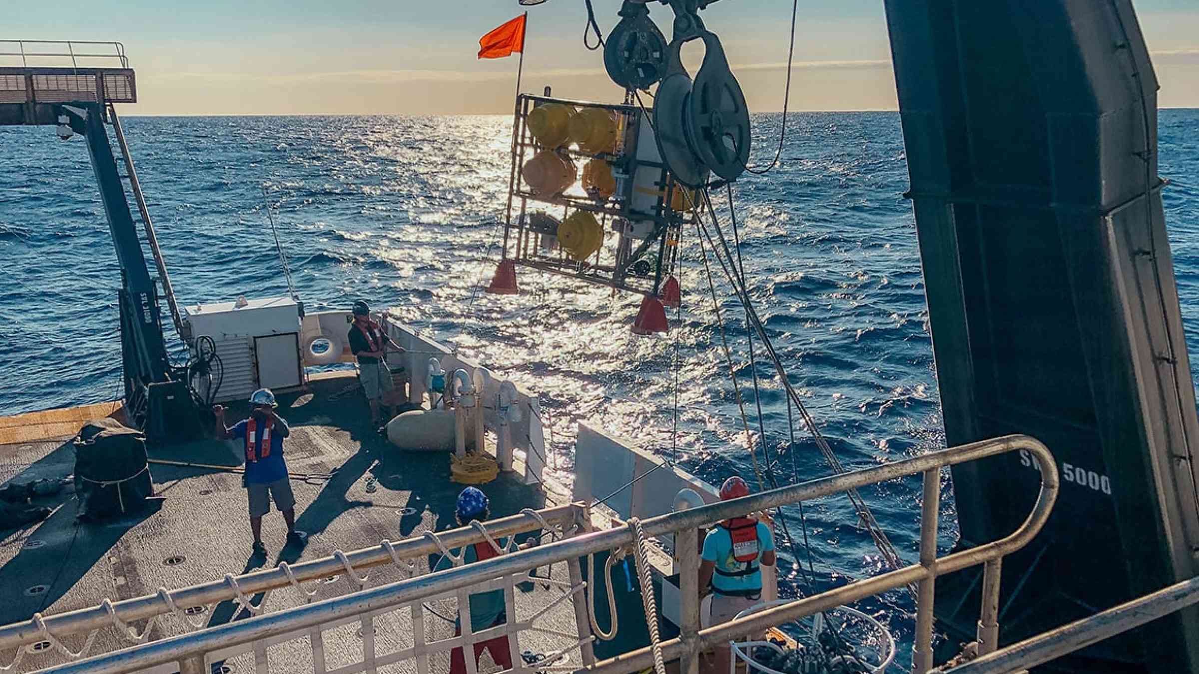 Researchers recording oceanographic data as part of the NOAA Deep Search study
