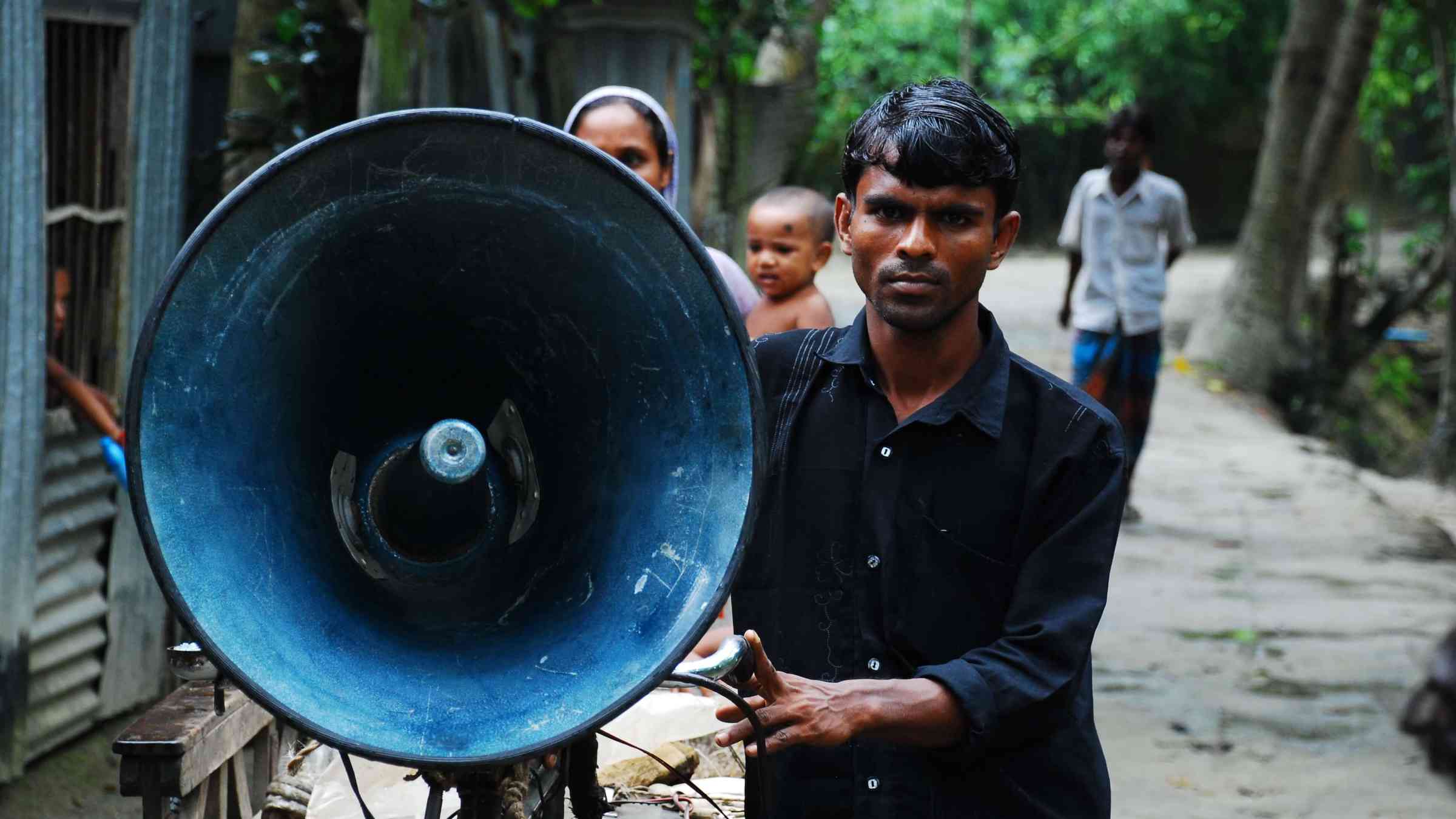Man carrying a speaker