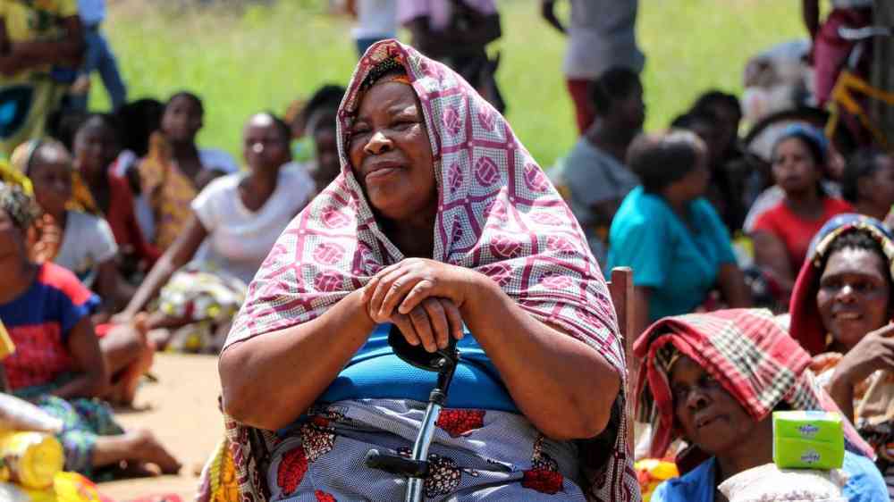 A woman after receiving her humanitarian kit after Cyclone Freddy - Mozambique