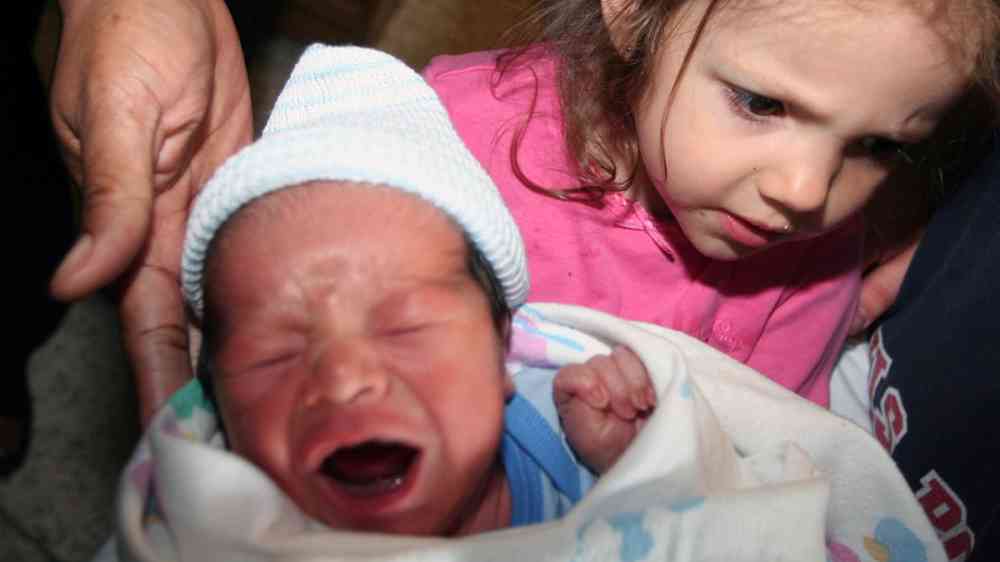 Young family with newborn baby