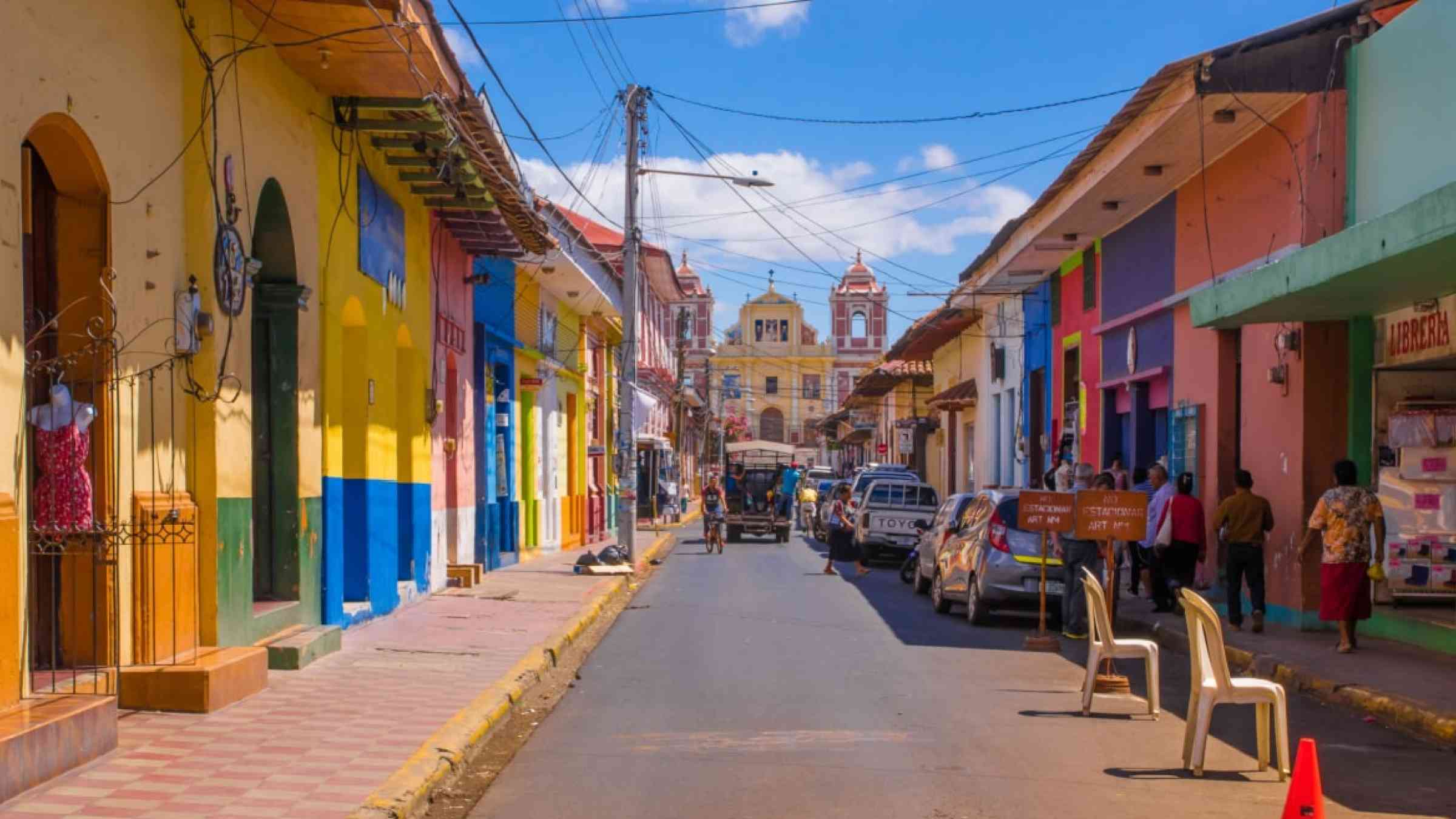 Outdoor view of people on a street in Leon, Nicaragua.