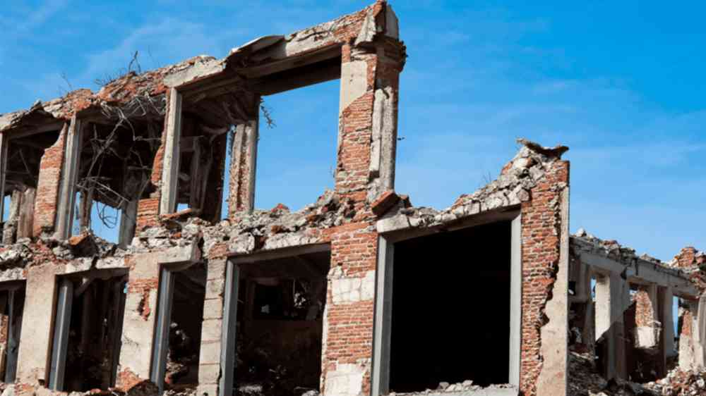 The ruined remains of a building after an earthquake