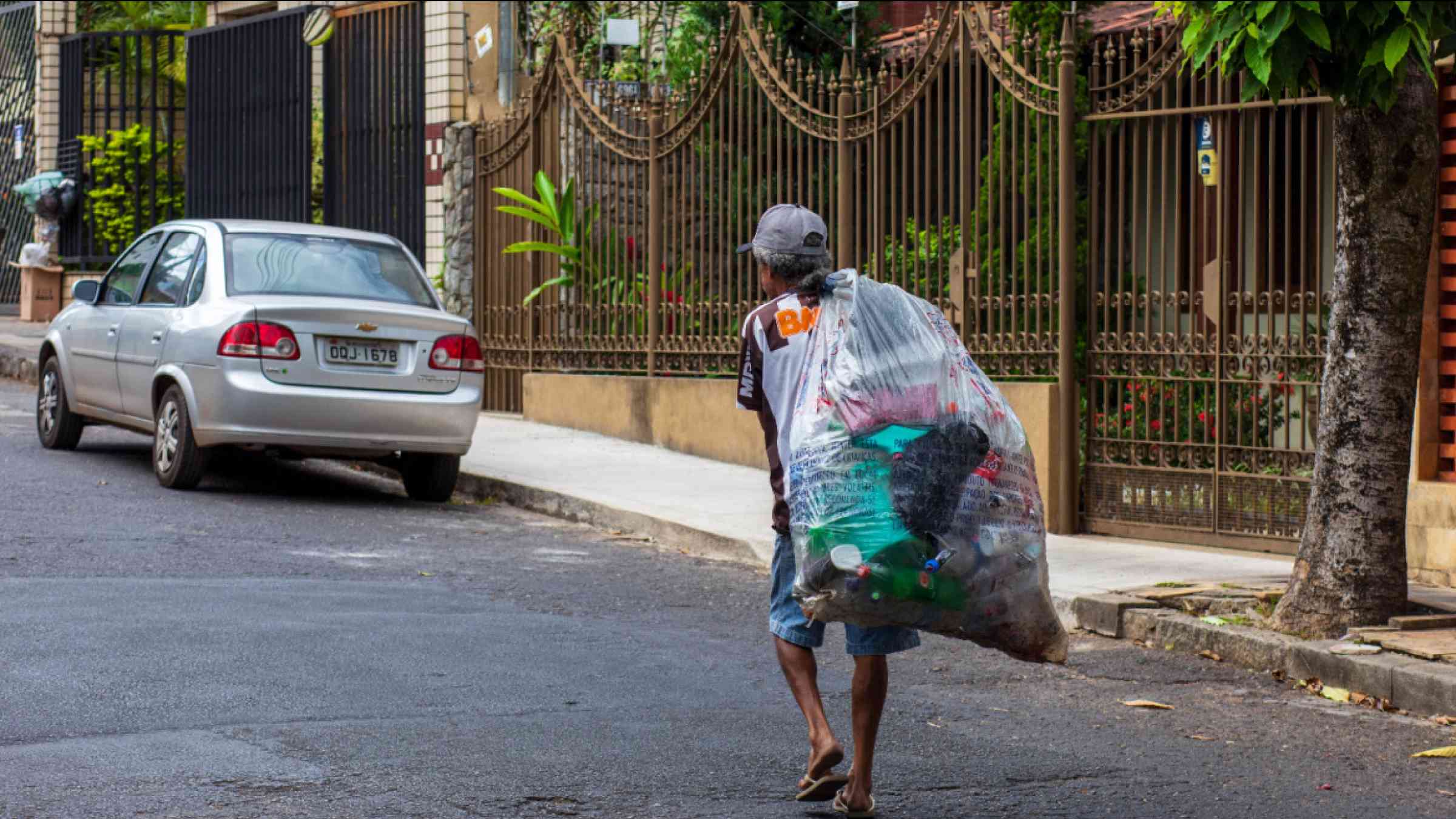A waste picker walking on the street in Brazil
