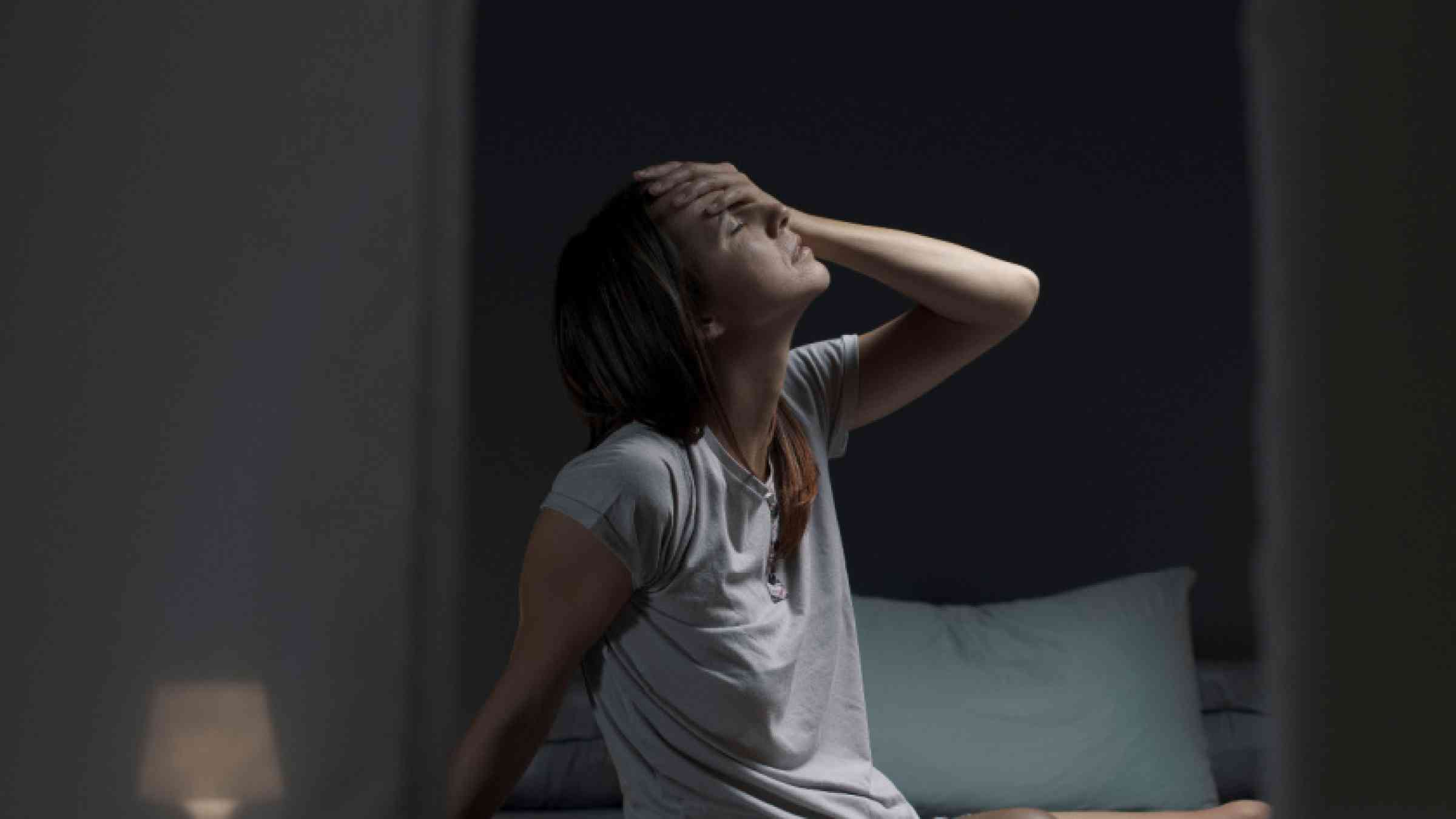 woman experiencing heat at night