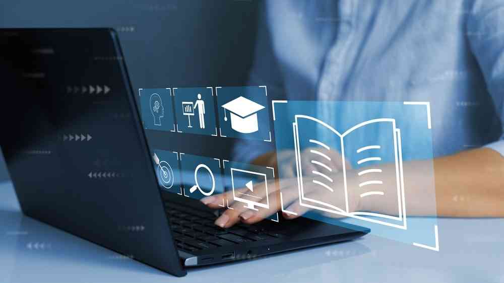 Person who attends online lessons on a digital screen