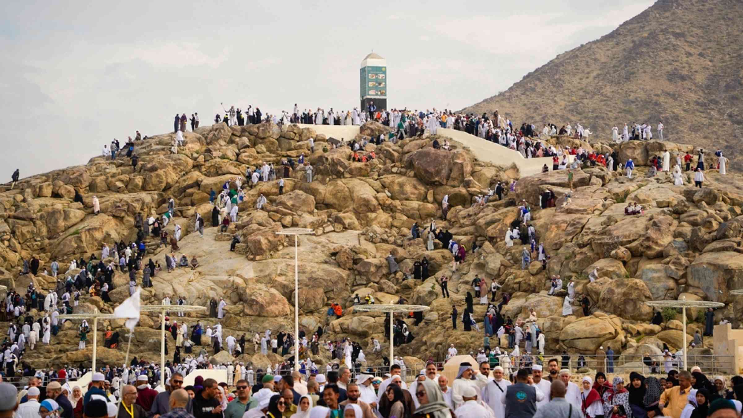 Pilgrims climbing Jabal Rahmah/Mount Arafat
