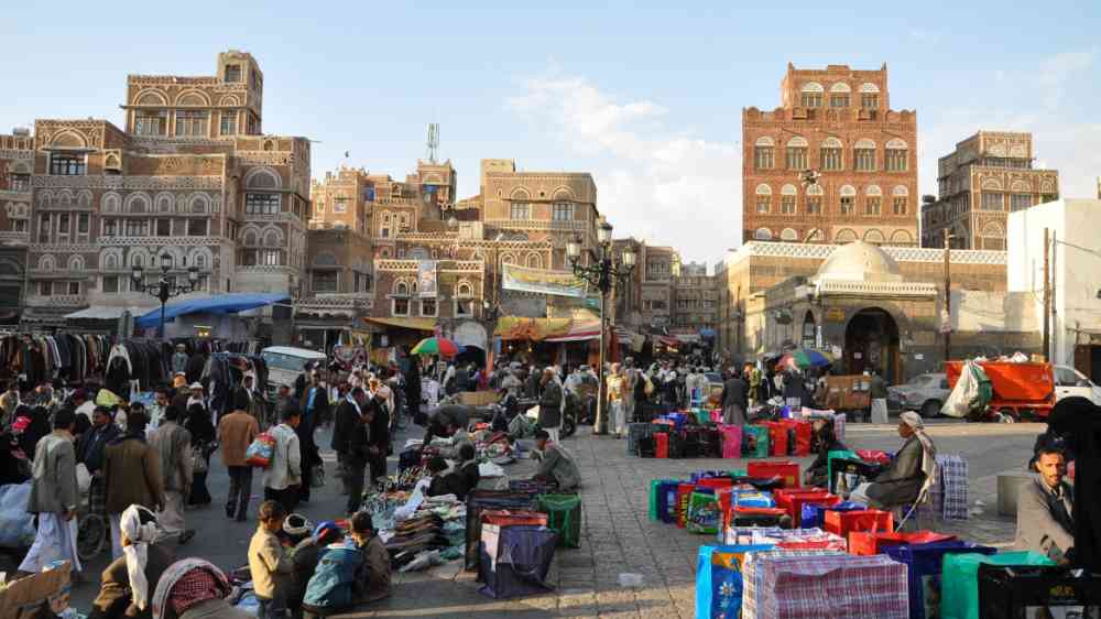 People walking and buying on the market of old Sana in Yemen on December, 28, 2009.