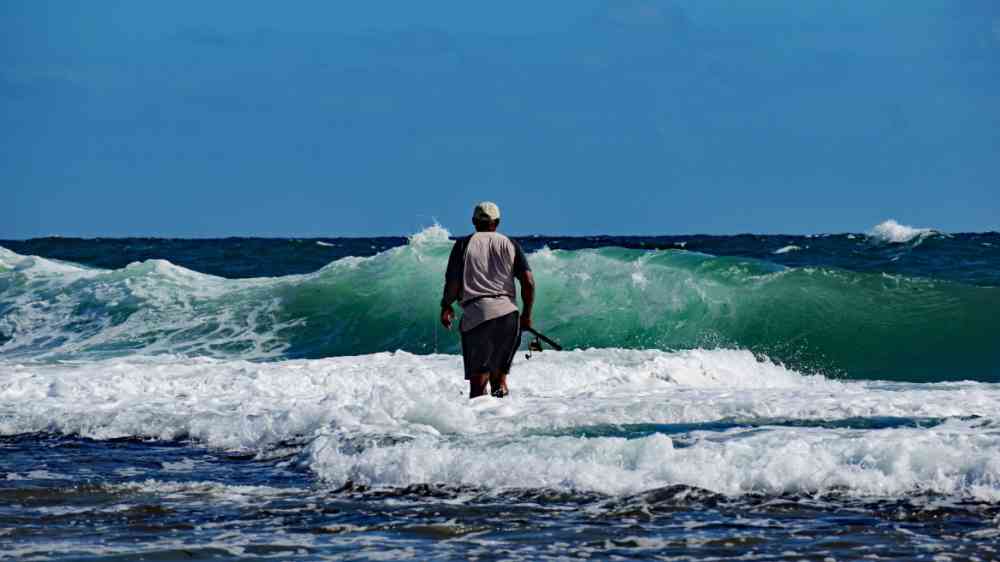 A lone fisherman on the east coast of Barbados during COVID-19 shutdown.