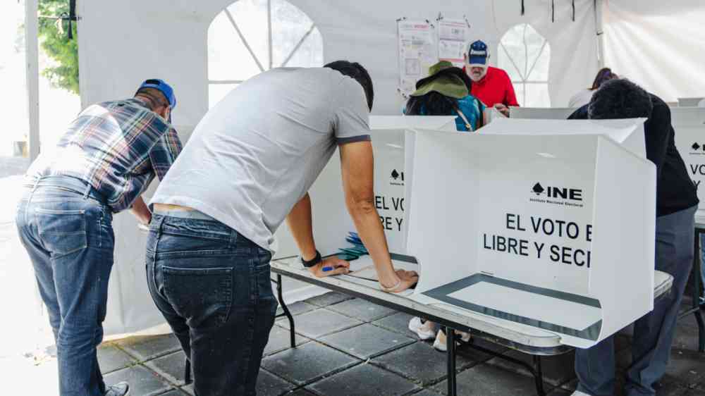 People are seen voting at a polling station during Mexico’s first judicial election in 2025