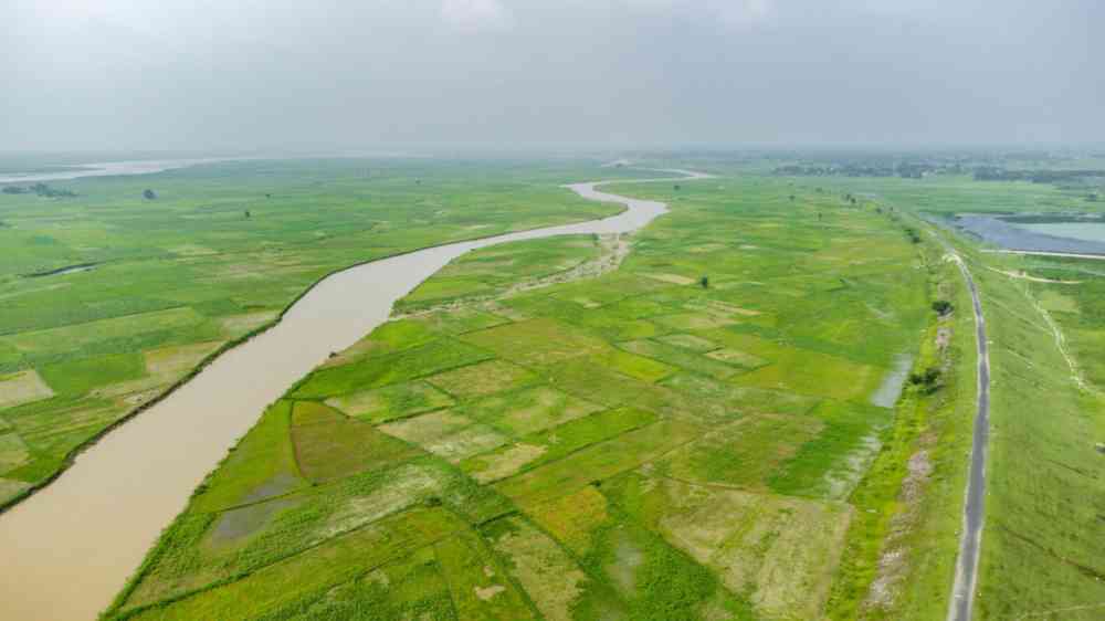 Aerial view of east–west corridor highway road near Koshi river in Sariagarh, India