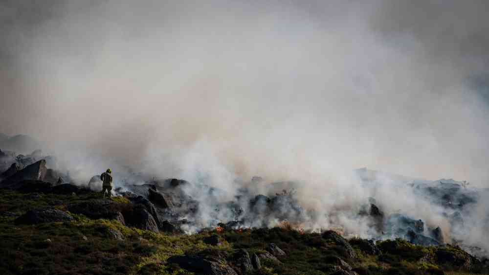 40 firemen/women were at Cilgwyn Mountain with police helicopter helping the fighters to survey the area.