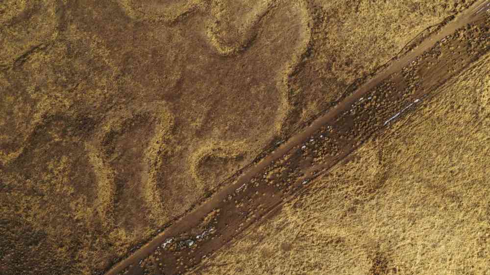 Drone shot capturing the dry, barren landscapes near Halleck, Nevada.